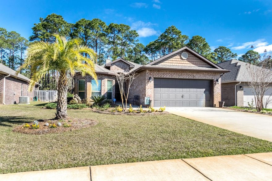 This stunning turn key home is like new and is definite MUST SEE! This spacious open floor plan featuring 4 bedrooms, 2 baths, and 2 car garage is located in the highly desirable neighborhood of Driftwood Estates. This home is situated on a large lot up against the trees creating a perfect blend of indoor and outdoor living. This highly upgraded home offers beautifully maintained engineered hardwood floors in the main areas of the home and master bedroom, gray cabinets with stunning light granite countertops that is complimented by a beautiful white subway tile backsplash, over sized breakfast bar in the kitchen, vaulted ceilings in the living room, stainless steel appliances and wood burning fireplace with granite surround. The Master Bedroom features elegant tray ceilings, a large walk in closet, tiled shower and a relaxing soaking tub.The home also features three spacious guest bedrooms and full guest bath. The guest bath features a large vanity and shower/tub combo for guest convenience. One of the additional bedrooms features a gorgeous bay window allowing for plenty of natural light which makes this room great for a home office or playroom for the kids. Off the dining room the home has two French doors leading out to the screened in patio offering a great place to entertain or relax with nature.

Driftwood Estates Community is a highly sought after neighborhood just minutes from the Beaches of South Walton and 30A. The community includes a well maintained pool, ponds, sidewalks, parks, playgrounds and well landscaped common areas. This neighborhood is minutes from Sacred Heart Hospital, upscale shopping, popular local dining, entertainment, area golf courses and Grand Boulevard. Do not miss your opportunity to own this beautiful home in a great neighborhood!