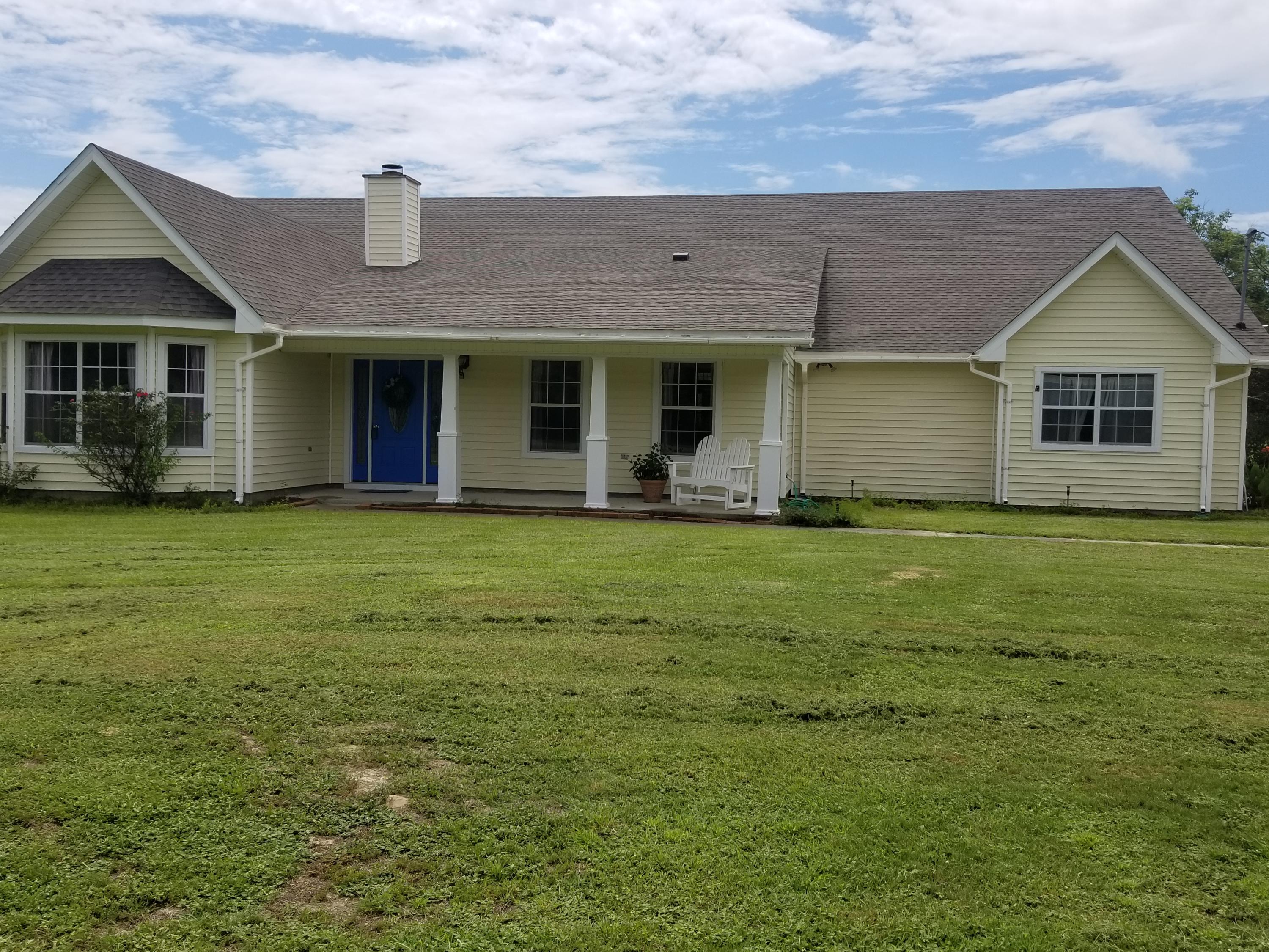 Spacious Living in East Navarre. This Home offers over 3700 living square feet and sits on 1.02 Acres in sought out subdivision of Whispering Pines. No Homeowners Association. Convenient to Beach, Shopping, Restaurants and 10 miles to Hurlburt Field AFB. Amazing Open Floor Plan, with a huge Great Room, Gas Fireplace, Wet Bar, nook area and kitchen equipped with Chefs 5 Star Gas, Six Burner Stove with double ovens, 3 bowl Stainless Steel Sink, Bosch Dishwasher, French style SS Refrigerator, Prep Sink and a walk-in pantry. Formal Dining & Living Room plus a Florida Room that leads out to an amazing 40 x20 Gunite Pool, solar panels & Screened Enclosure. Spilt Floor Plan with 4 bedrooms, with roomy walk in closets. Master Bathroom offers a deep therapeutic jet tub & separate shower.