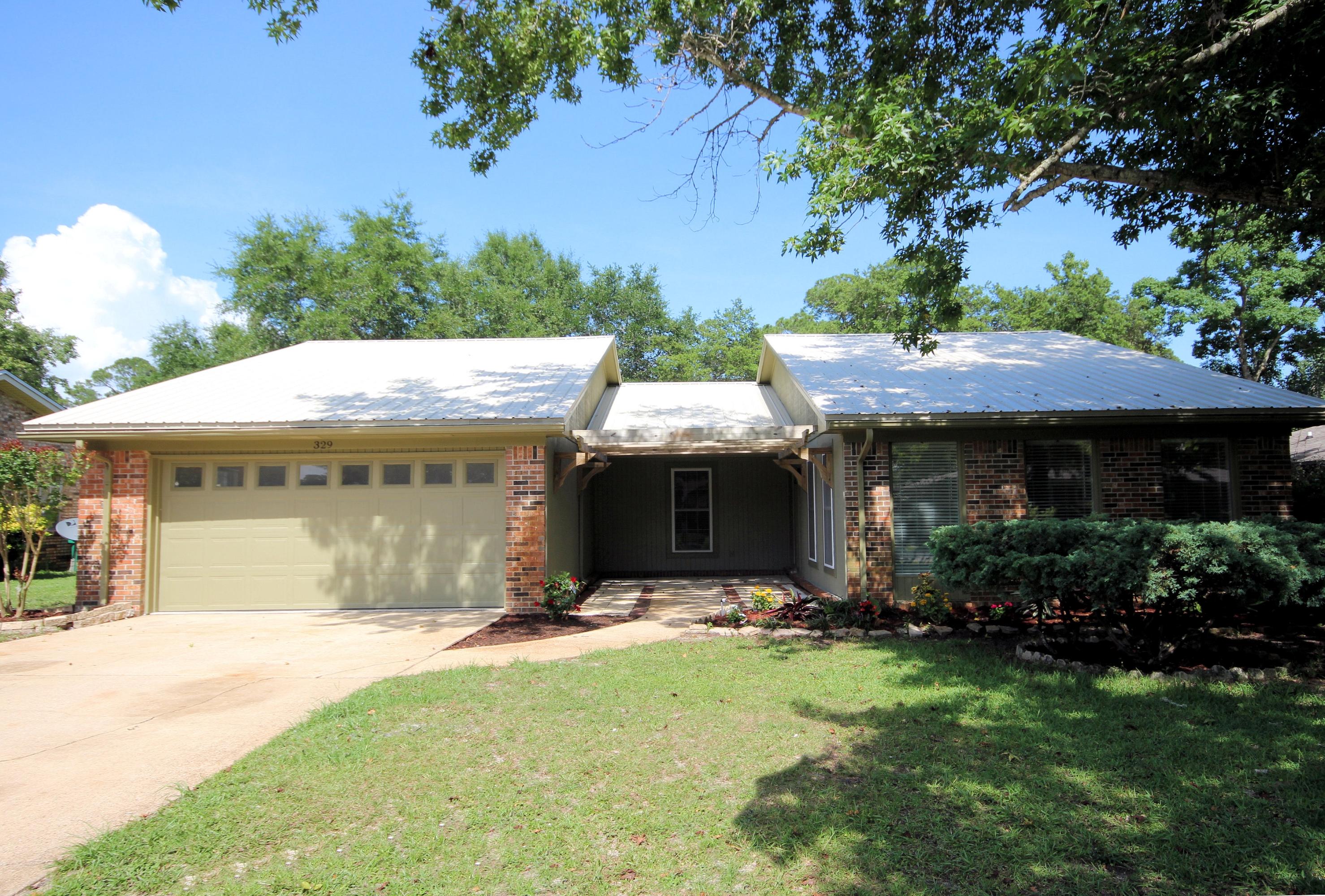 Home is ready for new owners. Home has been remodeled. New kitchen cabinets, stainless steel appliances, granite countertops, tile backsplash, new interior paint, tile flooring throughout home except for bedrooms. New cabinets and tile flooring in both baths, all new lighting fixtures, flooring in garage and on screen porch painted. As you walk into the home the living room is on the right, step up to the dining room and then enter into the very open kitchen with a family room. Directly behind the family room is a screened porch. The bedrooms and baths are down the hall from family room. Come see this home today. It is not going to last long.