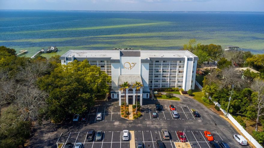 Lucky You!  You have just stumbled upon a magnificent condo overlooking the water and just minutes from Crab Island, Destin's best beaches and popular restaurants. At this unbeatable price, and with no short-term rentals allowed, you will make this 1-bedroom ''suite'' your home. You can enjoy a quick game of tennis, soak up the sun on the deeded beach, or take a few laps in the pool to warm up or cool off. After a day filled with activities, sit back and relax as you watch the stunning sunset over the water.  Want to see more?  Call your favorite Realtor today for your VIP tour of Unit 209 and the beautiful gated community of The Valencia.