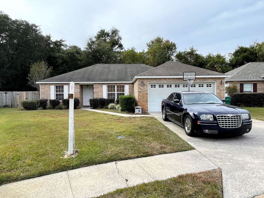 Home comes with a 1 year home warranty. New Roof December 2022 Updated Tankless water heater, Updated HVAC Unit. Fantastic Location to Hurlburt Air Force Base, Eglin Air Force Base, & FWB Hospital!!  Spacious four-bedroom two bath home located in Fort Walton Beach! This home greets you with a large and spacious living area. The living space flows to the kitchen, which is bright and perfect for cooking and entertaining. The main bedroom has tray ceilings. The master bathroom has a huge walk-in closet, double vanity, and a separate shower! The other 3 bedrooms are spacious and are separate from the main bedroom! Gas fireplace, 2 car garage, backs up to green space. Covered Back Patio. Detached Storage Building. Garage has a deep wash tub sink.