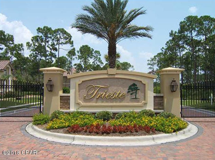 Beautiful waterfront lot in the gated community of Triste. You are central to everything on the beach. Golfing, Entertainment, shopping, restaurants, beach. What more do you need? Build your dream home among these mediterranean style homes.