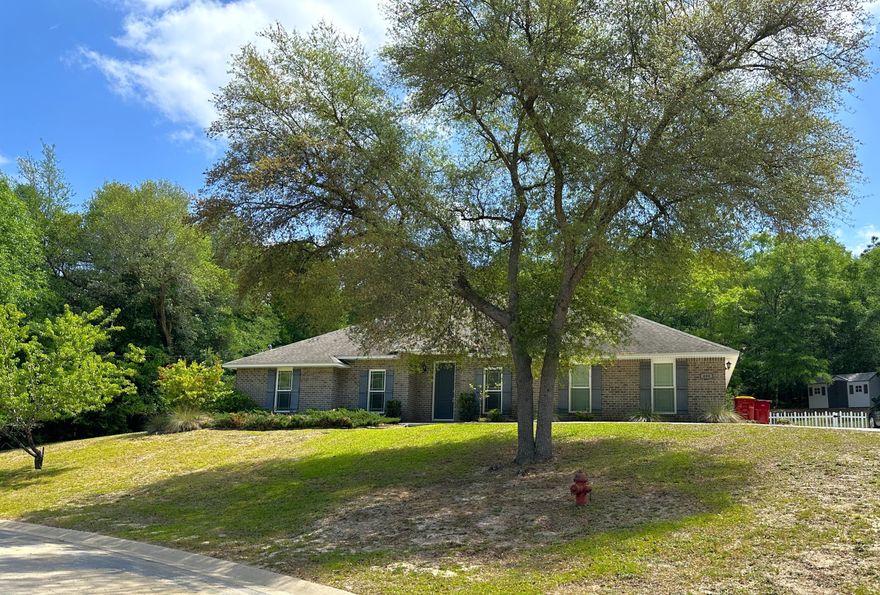 It's not often you find an acre of land in the city limits, but it's certainly here at this beautiful 5 bedroom home in Indian Trails. You get the feel of living in the country, but with neighbors and just minutes from all the conveniences of town. This 'must see' home is priced to sell and has all the features you need to make a beautiful home. There are no 'small' rooms here and the split bedroom floorplan uses the space thoughtfully. It features a beautiful kitchen with granite countertops, center island, new stainless steal appliances, pantry and plenty of counter and cabinet space for all your kitchen needs. The master bedroom is huge and has a beautiful tray ceiling with ambient lighting, and the master bath has double vanities, 2 large closets, water closet and wet-room with a big