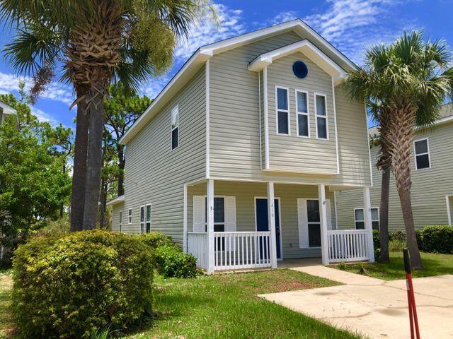 Florida Cottage in Enchanted Estates that backs up to 40 Acres of Forest land. Great Layout 3 Bedroom, 2.5 bath with tile floors in main downstairs. Open concept living with main level kitchen, dining and den spacious and enjoyable. The Community offers a large pool, dog walk and playground. Easy maintenance exterior siding and move in ready. Convenient location & close proximity to Sacred Heart Hospital, Fabulous Restaurants, Publix, Retail Shopping, The Grand Theatre and as always.. 30A & Sandestin festivities. Located minutes to Top Sail State park and THE BEAUTIFUL beaches of South Walton.