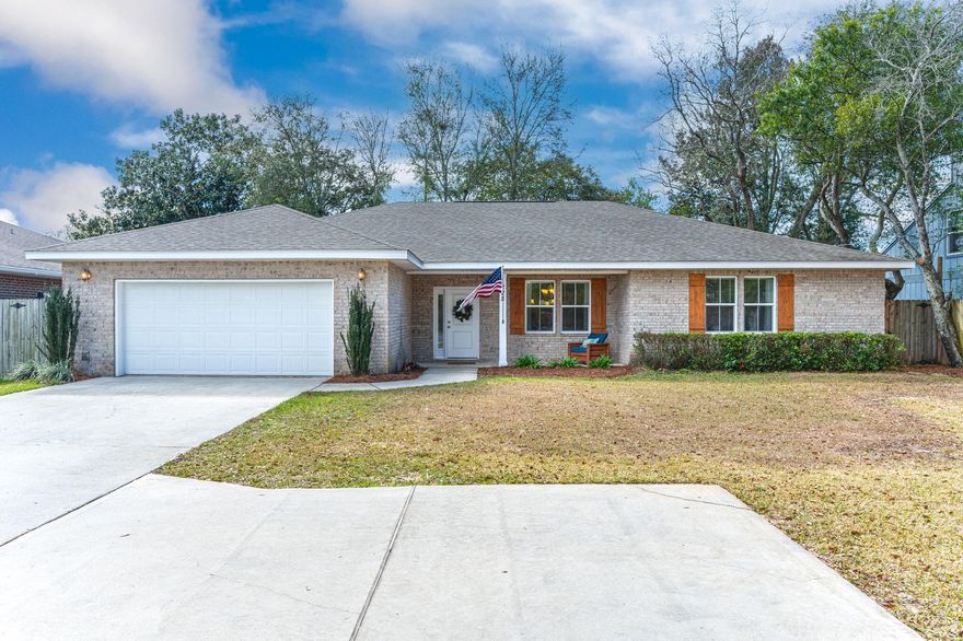 Welcome to this fantastic 4-bedroom, 3-bathroom home, comfortably set back from the road by a spacious front yard and driveway featuring an extra parking/turnaround pad. From the charming, covered front porch, enter directly into the heart of the home - a gorgeous, open-concept kitchen, dining, and living space. The kitchen is appointed with abundant shaker -style cabinetry, stainless steel appliances, granite counter tops, and a dreamy breakfast bar perfect for entertaining or casual meals. The large master bedroom and en suite bath are tucked away on one side of the home while 3 additional bedrooms and a full bath can be found on the other. Find a third full bath conveniently located to the access to the backyard, making it ideal for guests or future pool usage. CLICK