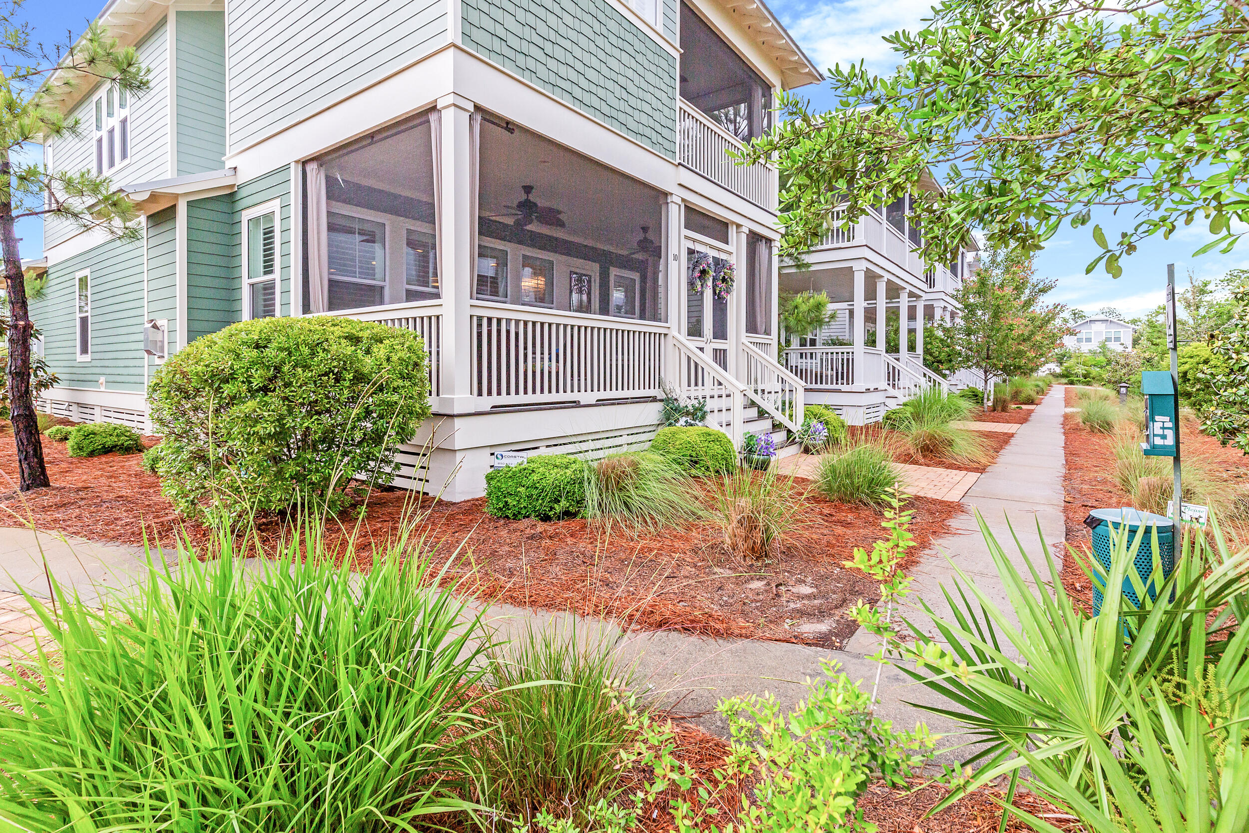 Homes on Sunset Pond, do not come on the market often... and this one is the best homesite- oversized & on the corner! Great location, just a bike ride away from the community amenity center- The Gathering Place. This home has been meticulously maintained and rented out very minimally. Perfect floorplan for a full time resident or rental home- offering TWO primary suites. Rental projections are around $80k! Relax on the front screened porch and take in the soothing sound of the fountain or lounge on the porch swing for those lazy days. This very upgraded & furnished home has all you need- spacious, bright living room with cozy fireplace and wall to wall windows that opens up to kitchen.