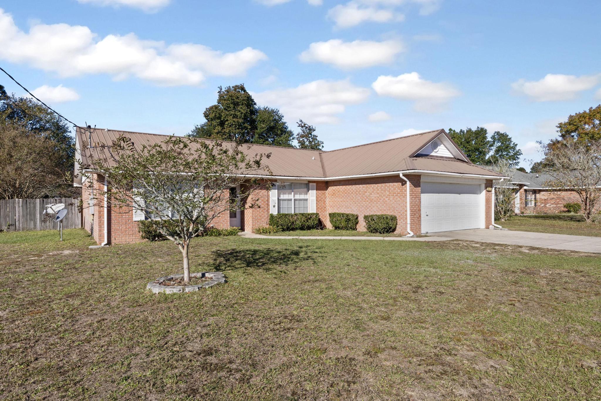 Welcome to this beautiful, all brick, 4 bedroom, 2 bathroom home in the family community of Countryview Estates only minutes away from all the military bases and beaches in the  Panhandle area. The third of an acres yard has plenty of room for a fabulous pool and outdoor living space. The beaches of Florida are a short ride away and you can hop on I-10 for convenience to all the beautiful springs, Disney World and all areas in the South. The Home is a split bedroom floor plan with master suite on one side and 3 bedrooms with a shared bathroom on the other. The laundry room leads to a spacious two car garage with plenty of storage space. This is a wonderful family home or a great investment opportunity for sought after rentals close to 3 bases. There is a current home warranty in place