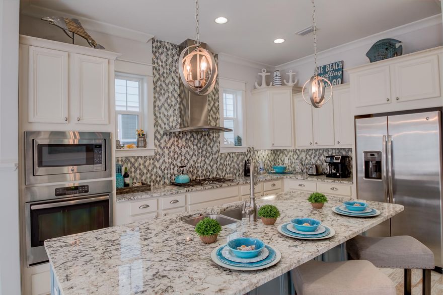 FULLY FURNISHED WITH 2018 RENTALS ALREADY ON THE BOOKS!! This highly coveted, better-than-new Cozumel 3-bedroom floor plan townhome with large 2-car garage in Prominence sells turn-key ready for immediate rental income or personal enjoyment. The spacious open floor plan is both inviting and functional, with features including: a powder bath on the main level; gourmet kitchen with a large island, granite countertops, stainless steel GE appliances, and beautiful backsplash. Upstairs, the master suite boasts a luxurious private en suite bath with double sink vanity and tile shower. Two additional bedrooms and a second full bath allow plenty of room for families, making it the perfect residence or rental investment.