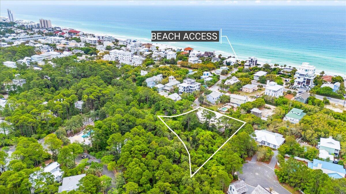 Presenting a rare opportunity to own a premier 1.34-acre lot tucked away at the southern end of the highly desirable Grove by the Sea community. Surrounded by mature trees and coastal charm, this expansive homesite offers an ideal setting to build your coastal retreat.Located just a short walk from the community's two private pools and only 0.25 miles to a public beach access, where turquoise waters and sugar-white sand beaches await.Grove by the Sea is situated in the heart of Seagrove Beach, and minutes from the iconic Seaside Town Center, offering shopping, dining, and entertainment. With quick access to Scenic 30A, you'll also have endless opportunities for biking, hiking, fishing, and so much more! This is a unique chance to bring your  dream home to life in one of 30A's most beloved neighborhoods. Contact us today for more information!
