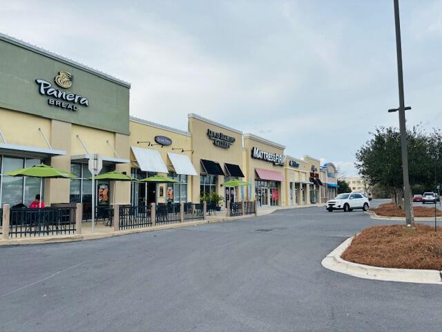 The very desirable and practicle retail space is located adjancent to a national restaurant with shopping amenities like ATM and EV Charging on premises. With ample parking and easy access this shopping center location is ideal for a professional tenant such as an optometrist.