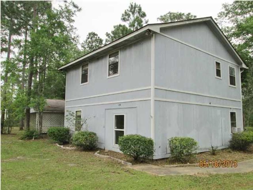 Foreclosure, two story home located on an acre lot. Home needs work. Home sits on two, 1/2 acre lots. Home is on well and septic tank. There is a one car carport and a workshop on property. Property is being sold as-is. *** This property is eligible under the Freddie Mac First Look Initiative through 05/31/2013. During the first 15 days a home is listed for sale in the MLS, only offers from owner-occupants (primary residence), second home buyers and public entities or their designated partners will be considered. Offers from investor purchasers will not be considered until AFTER the initial 15 days of the listing. *** Seller is offering a home warranty credit up to $500 for owner occupant offers (primary or secondary home) . The buyer must identify and select the home warranty company
