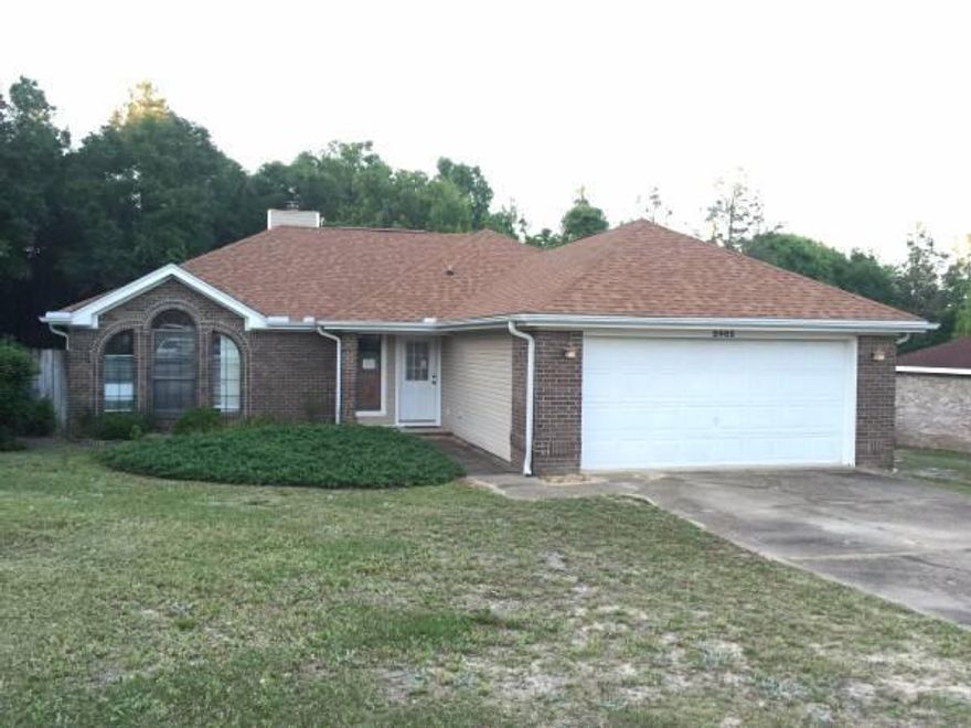 Beautiful 3 bedroom 2 bath home located in a quiet neighborhood. Updated features include; tile, carpet, fresh paint, granite counter-tops, a large open floor plan and high ceilings. Beautiful fireplace! Large back deck and yard perfect for outdoor activities! Split floor plan for added privacy. Garage has been converted into living space, but can easily be switched back to a garage.