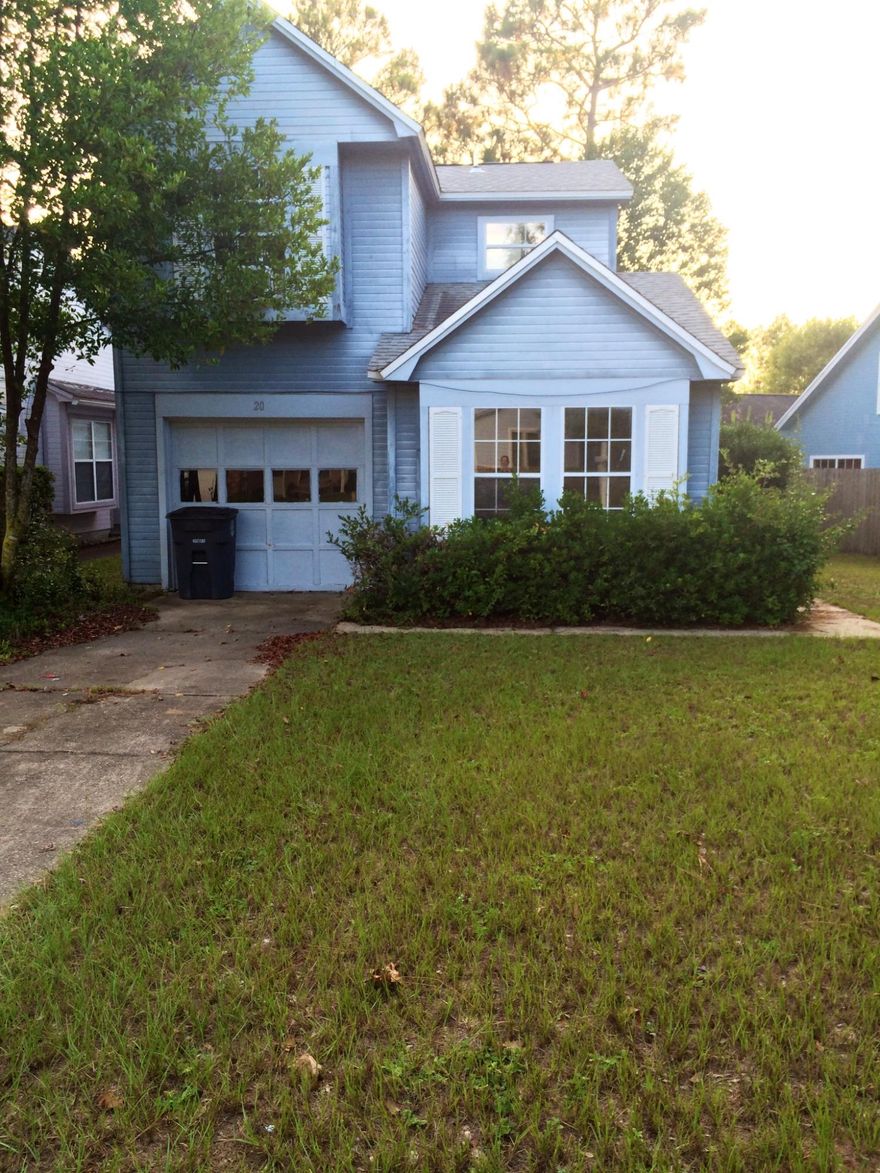 SHORT SALE! Lovely home in great family neighborhood on a quiet cul-de-sac. Great location just outside the edge of Niceville and only minutes to the airport and Eglin AFB. Great split floorplan with the Master bedroom downstairs and additional 2 bedrooms upstairs. Open kitchen overlooking dining room and living room with vaulted ceilings and a fireplace! The lush backyard with wood deck is great for BBQ's. This home has lots of potential with just a little TLC!