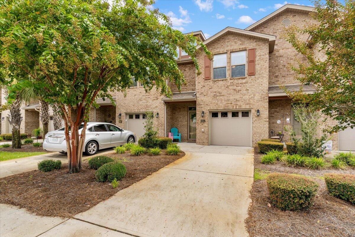 Welcome to Reserve Pointe!Located in the highly sought-after East Navarre area, this stunning all-brick, two-story townhome has been only used as a second home. It's the perfect blend of comfort, style, and convenience-just 15 minutes from Navarre Beach and 15 minutes from Hurlburt Field Air Force Base. Reserve Pointe also features fantastic community amenities, including a sparkling swimming pool, sidewalk paths and a playground.Step inside this beautifully maintained 3-bedroom, 2.5-bathroom home and discover a thoughtful layout with modern finishes throughout:Luxury vinyl plank wood-look flooring downstairsPlush carpet upstairsSpacious master suite with walk-in closetGranite countertops & breakfast barKitchen with stainless steel appliancesPantry storage Recent Upgrades Include:
New storm door (front)
Finished closet under stairs for extra storage
Gutter system
Tesla EV outlet
Custom Container Store garage storage system
Allergy-free one owner home (no smoking, no pets)
Primary bedroom closet organizer
Hurricane protective coverings & hardware
Newer garage door
Exterior care ($335/month) includes pool, landscaping, irrigation & sprinklers
With its prime location, modern upgrades, and desirable amenities, this home truly has it all. Don't miss your chance to own this move in ready retreat in Reserve Pointe-schedule your showing today!