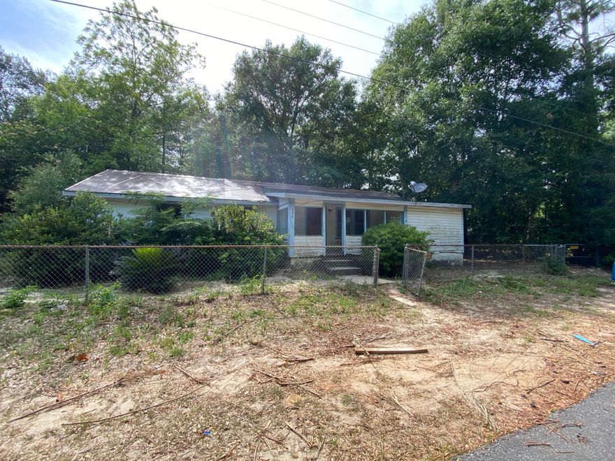 Tons of opportunity with this Auction REO home! Built in 1950, this 4 bedroom 2 bath home is completely fenced, has split bedroom design, 1260sf and rests in the heart of Crestview. Close to schools, hospital, shopping and interstate, this home will appeal to potential owners and investors alike. Call Today! Seller's asking price is $34000.00
