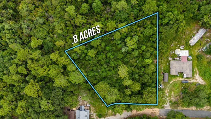 This beautiful 0.8-acre lot is perfectly situated just across from waterfront properties. Located just minutes from town, you'll enjoy the convenience of nearby shopping, dining, and schools while still having the space and privacy to spread out. The property backs up to a conservation area. The property is zoned urban residential.  It does appear mobile homes are allowed but this should be confirmed with the local planning and zoning departments. City water is available at the property but the tap is not paid.