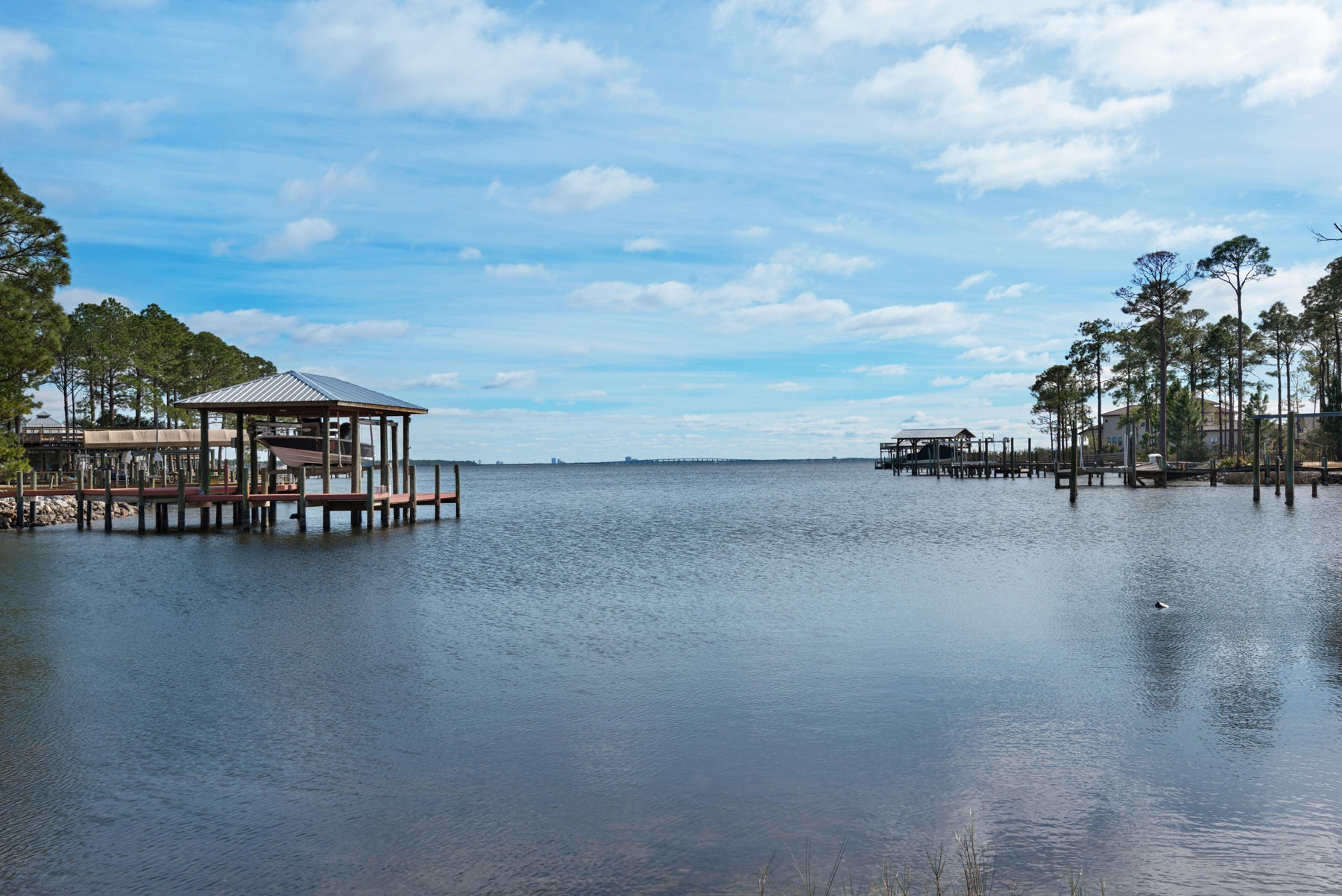 Stunning waterfront property off a protected inlet of the Choctawhatchee Bay is just what you were looking for.  Sitting on an oversized lot with bayou access, this nearly 4,000 square foot home features 4 oversized bedrooms, 4.5 baths, and water views throughout. This home truly has it all, and then some. 2 kitchens, 2 living rooms, 2 master suites, 2 garages, a golf cart garage entrance, a sun room, and a backup generator all sitting on an oversized waterfront lot. This single story house is a home you will never grow out of.  Call today to schedule your tour of this one of a kind home before it is gone! The large updated kitchen features kenmore elite appliances and granite countertops.