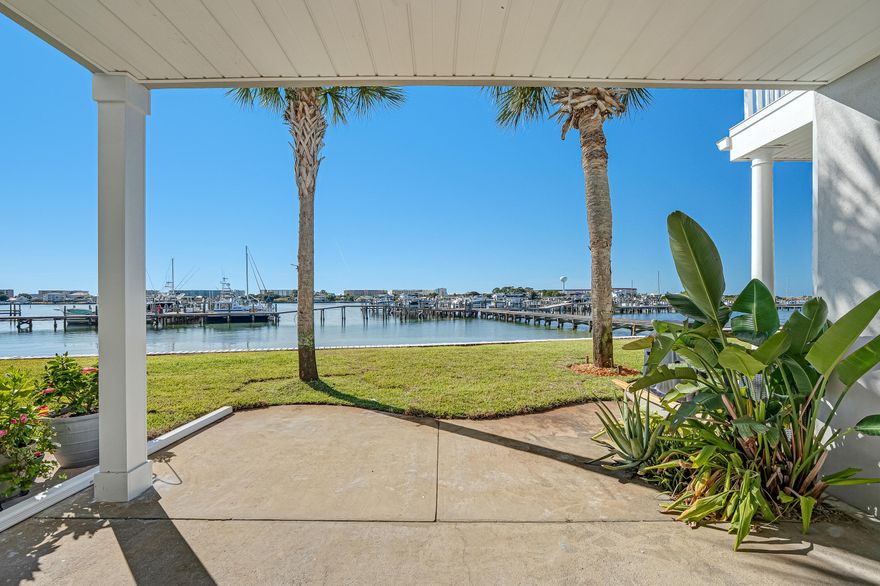 Rare opportunity to own an Intercoastal waterfront townhome in Fort Walton Beach with a private 36' boat slip. Enjoy wide water views, dolphin activity, and convenient boating access. The bright, open living area features a shiplap accent wall and crown molding, flowing to a waterfront balcony ideal for sunrise and sunset. Kitchen and bathrooms were updated in 2020 with granite. The primary suite offers panoramic water views, its own balcony, and a spa-style soaking tub. Additional bedrooms offer flexible use options. Major updates include a 2021 roof with lifetime shingles and a new balcony in 2025. Convenient to beaches, dining, and everyday services. Boat in lift sold separately. Low-maintenance coastal living with well-maintained finishes throughout. Gated community with only 19 homes. Boat slip is D-17. The HOA breakdown is Brooks Landing is $300 per quarter and Marina fees are $450 per quarter. Optional fee is pool access for $250 a year, low HOA fees.