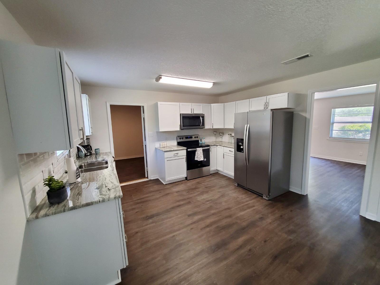 Show and sell--Grab it quick.. Home has been completely remodeled from top to bottom. New drywall all house, New HVAC, new roof, new copper wiring, new kitchen and baths, stainless appliances, new fence around back and left side, new fans and lights, new floors, new paint in and out. etc etc etc.