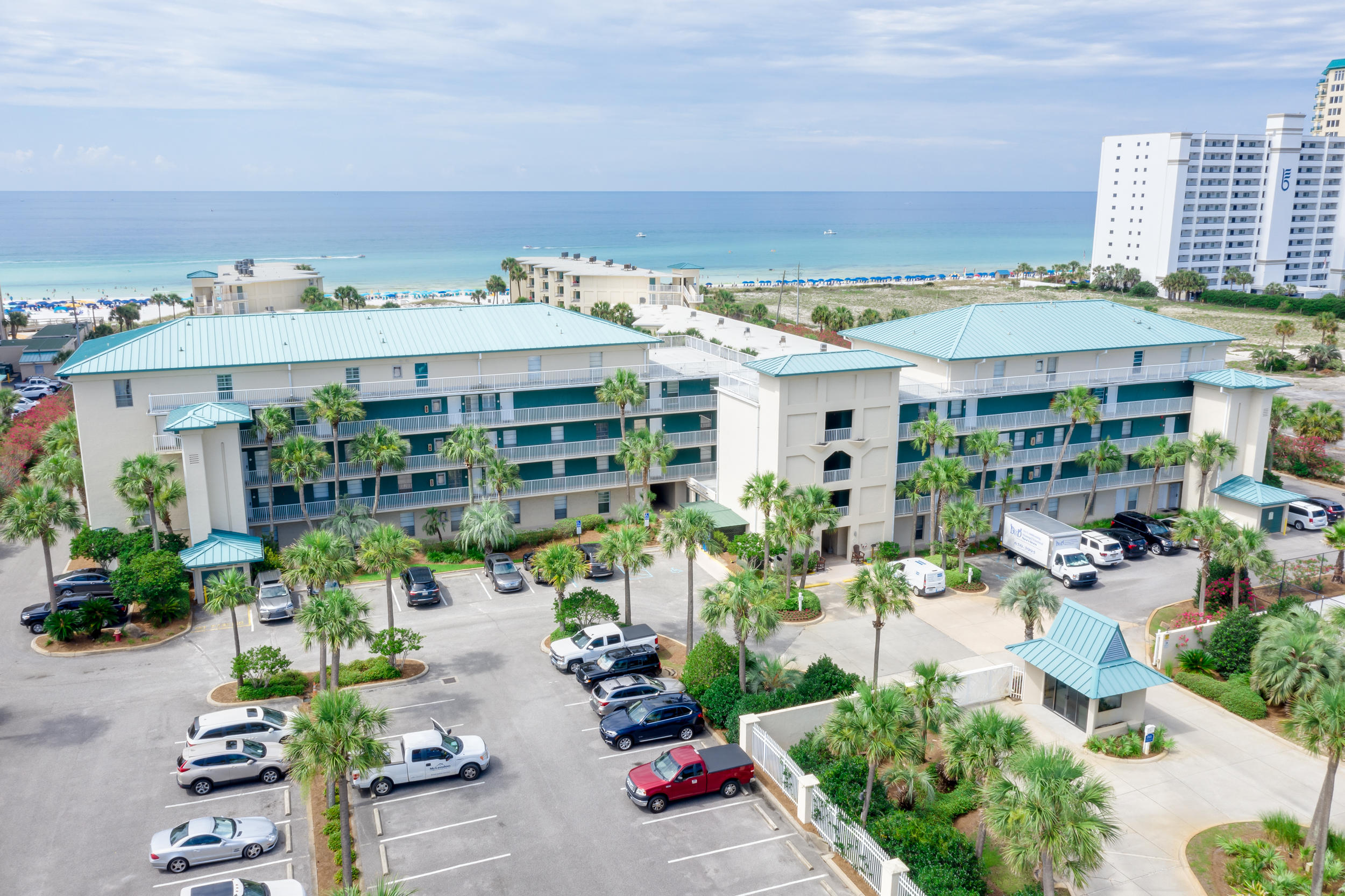 LIGHT & BRIGHT describes life in this comfortable two bedroom, two bath condo. Enjoy direct views of the gulf & courtyard from the living area & balcony while sipping your favorite beverage. Located in the desirable gated community of Silver Dunes, only a short walk to the beautiful white sandy beach. The unit is fully furnished & accessorized. The master bedroom houses a king-size bed while the second bedroom has a queen with the sleeper sofa the unit can sleep eight. Own a piece of paradise at a very affordable price! Silver Dunes is an eight acre popular gulf front resort complex close to Big Kahuna's, Target, & many fine & fun restaurants. Other amenities include a gulf front pool, fitness center, arcade room, shuffleboard court, two lighted tennis courts, BBQ grills, & best of all