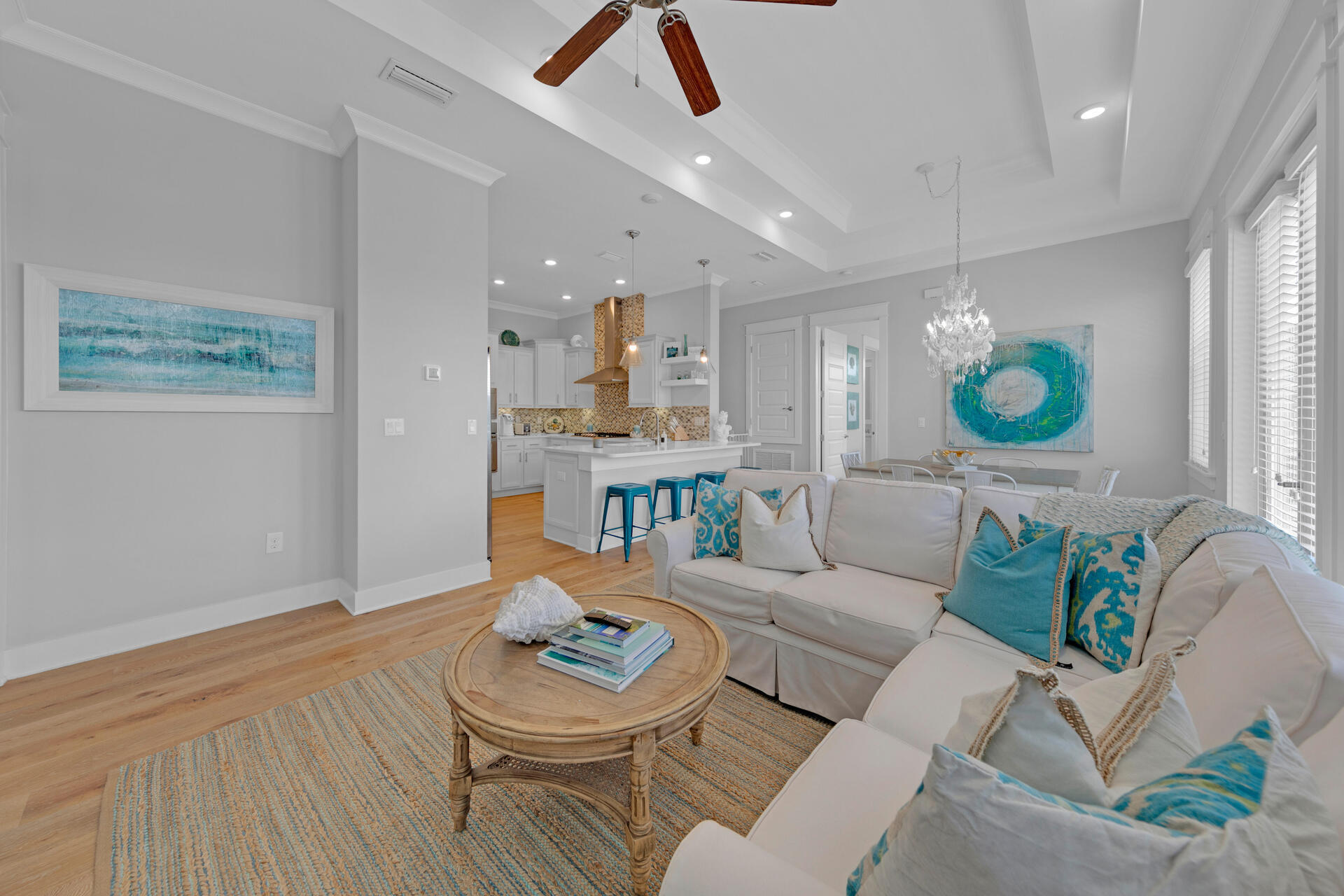 Posh 30A townhome in Prominence with fabulous proximity to The HUB.  This corner unit near the community pool offers a fun, easy option for family and friends to enjoy.  Additionally, you will enjoy the convenience of a 1 car garage for parking out of the salt air and storing beach gear and bikes.  Craftsmanship of the highest quality catches your eye with 10 foot ceilings, 8 foot doors, hardwood floors, and custom cabinets.  Interior accented with boutique lighting and turquoise colors highlighting the gulf coast.  Gourmet kitchen with stainless steel appliances, quartz countertops, gas cooktop and beautiful backsplash attracts the best of chefs.  HOA includes exterior insurance/maintenance, termite annuals, landscaping, beach shuttle, security, pool, and gym.