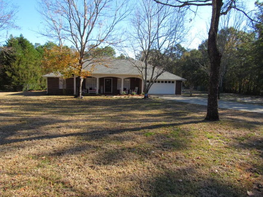 MULTIPLE OFFERS ! 1 ACRE in a desirable neighborhood ! This home has received a complete renovation to include lighting package, all flooring, paint, and master bath vanity. From the entry of the sitting porch the home has great curb appeal. You feel the love and comfort of this home as you enter into the living area. There is a dining area, as well as a, breakfast bar and a morning room with a coffee bar.  The laundry area has cabinets for storage and room for a freezer. The dining room French doors lead to the screen porch that  overlooks the  rear yard and has a small pet door.  The home features 1 acre with a fenced rear yard, fire pit  and a fantastic workshop!   Seller is ready to go!  Schedule your appointment today.