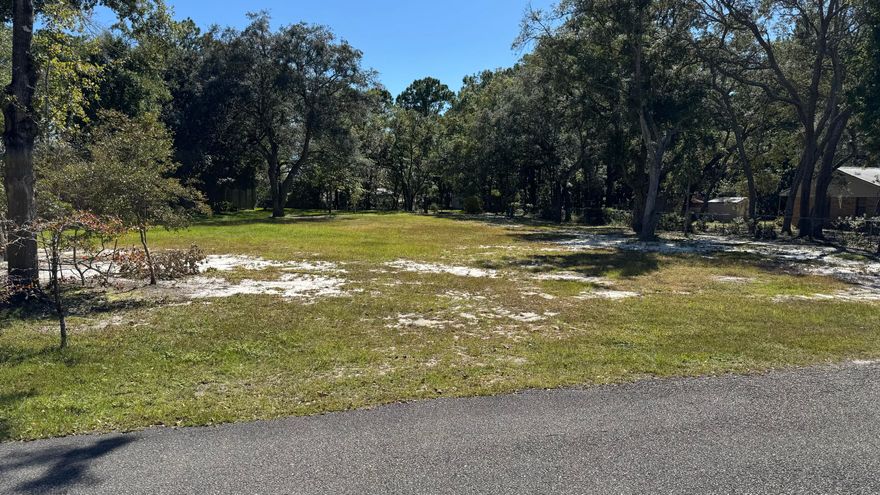 **Prime Canal-Front Lot - Perfect for Your Dream Home**Nestled along a 75-foot canal front with direct access to Mallet Bayou and the bay, this .66-acre lot is the ideal setting for your custom build. The lot is flat and cleared, ready for construction, and features a canal-front dock and a cement boat ramp--perfect for boating enthusiasts.With a never-used septic tank already installed and an irrigation well in place, the groundwork is laid for a seamless build. This is a rare opportunity for a builder or homeowner to craft the perfect waterfront retreat in a serene, picturesque location.Don't miss this exceptional property--it's a builder's dream come true!