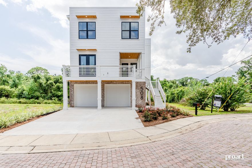 Experience Contemporary Coastal Living in the Heart of Destin!This stunning new construction is a fresh and modern take on coastal living, bringing a sophisticated new vibe to Destin. Ideally located near top-rated schools, the baseball fields, a boat launch, and the iconic Destin Harbor, this home offers the coveted lifestyle of convenience, recreation, and relaxation.As you step inside, you'll be greeted by an abundance of natural light that enhances the home's modern yet inviting design. The main living area is perched above the oversized two-car garage, creating a unique ''coastal treehouse'' feel with Serene views through the trees and across to Marler's Bayou. A lush vegetative buffer behind the home ensures privacy and tranquility, making this home feel like a true retreat.

The open-concept kitchen is both elegant and functional, featuring a large island, gas cooktop, walk-in pantry, and ample cabinetryperfect for hosting or quiet mornings at home. The spacious living and dining areas offer seamless sightlines, making entertaining effortless. A guest bedroom with a full en-suite bath, an additional half bath, and a beautiful covered porch complete the main level.

The master "retreat" can be found on the third level is nothing short of spectacular, offering elevated views of the bayou that create a sense of serenity. The spa-inspired en-suite bath is a true showpiece, featuring a spacious wet room with dual showers, a freestanding soaking tub, and a stunning bank of windows that flood the space with natural light.

Two additional bedrooms, a full bath, and a generously sized laundry room round out the upper level, designed for both comfort and practicality.

The oversized two-car garage includes a dedicated storage area, while the large covered patio below provides the perfect all-weather hangout space. High-end details such as tongue-and-groove wood soffits and outdoor ceilings add a touch of elegance, showcasing the quality craftsmanship throughout.

With its modern design, prime location, and thoughtful layout, this one-of-a-kind home is an incredible opportunity to experience Destin's bestwhether as a primary residence or a dream coastal getaway.  LOT NEXT DOOR ALSO AVAILABLE FOR PURCHASE, WHICH IS PERFECT FOR AN ADDITIONAL GUEST HOUSE OR GARAGE AND POOL!

Schedule your showing today! Owner is a licensed real estate agent in the state of Florida.  