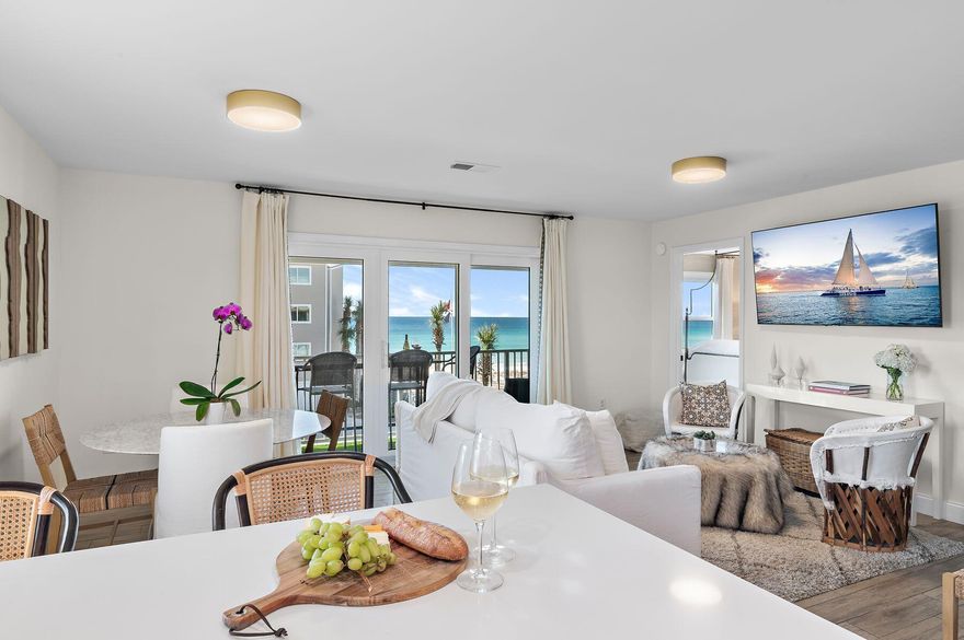 Just steps from the beach, this impeccably updated condo embodies refined coastal living, boasting captivating Gulf views and premium luxury enhancements throughout. Fully updated in 2022, it features a new roof, windows, doors, and siding, ensuring both style and durability.The spacious living area and primary suite capture stunning Gulf views, setting the perfect backdrop for a relaxed, upscale retreat. Elegant custom drapes, Parisian fabrics, and Lee Jofa wallpaper add a touch of refinement, while Visual Comfort lighting enhances the ambiance. Designer furnishings from Beau Interiors, Serena & Lilly, and Le Chateau European Interiors complete the stylish aesthetic.The gourmet kitchen is a showstopper, boasting waterfall-edge quartz countertops, premium stainless-steel appliances, and chic buffet sideboard/barideal for entertaining. Step outside to the expansive balcony, where the Gulf breeze complements alfresco dining and laid-back lounging.Three beautifully appointed bedrooms and two spa-inspired bathrooms showcase marble vanities, classic subway tile, and Kohler fixtures, with statement lighting adding a touch of luxury.Beyond the condo, resort-style amenities include a seasonally heated pool, tennis and pickleball courts, shuffleboard, and lake access. A convenient shuttle service to the nearby beach access makes every beach day effortless.With its stunning views, designer finishes, and top-tier amenities, this Gulf-view retreat is the epitome of luxury coastal living.