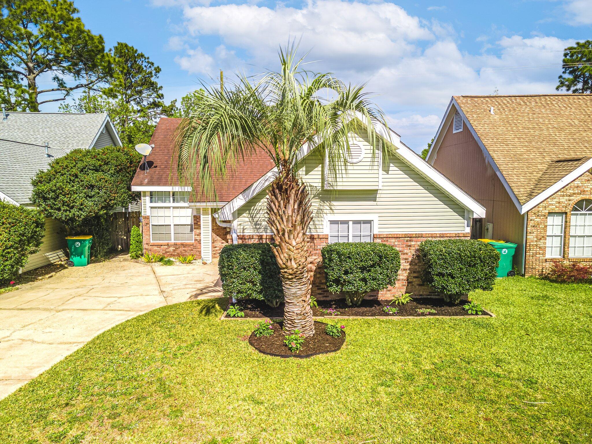 Charming home very conveniently located in Ft. Walton Beach, close to both Eglin AFB and Hurlburt Field. This home features a Cathedral ceiling to create space, a wood-burning brick fireplace to add to the coziness and charm. 2 convenient sliding glass doors lead to the back yard and patio area from the living room and the master bedroom also has a sliding glass door to the back ya. Beautiful wood plank style laminate flooring in the living area, with tile floors in the kitchen. The kitchen has oak cabinets, granite counters, stainless steel appliances, and tile back splash. A quaint dining area is just off the kitchen that's large enough for family, friends and get togethers. This home would make a great primary residence or a great investm