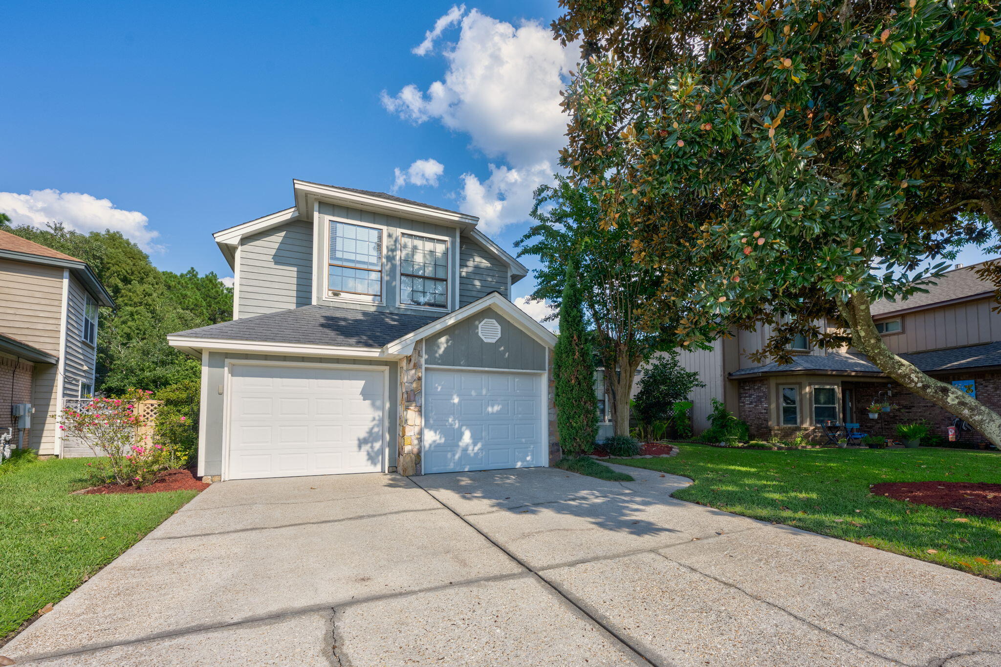 Welcome to 1819 Scirocco Loop, Fort Walton Beach, FL 32547, nestled in the serene private community of Crosswinds. This elegant, updated 3 Bed, 2.5 Bath home offers a perfect blend of modern amenities and classic charm, now enhanced with paid-off solar panels for energy efficiency and cost savings. Located just a short drive from Eglin Air Force Base and Hurlburt Field, this home is perfect for military personnel seeking convenience and comfort. Additionally, the proximity to major box stores ensures that all your shopping needs are met with ease. One of the standout features of Crosswinds is its low HOA fees, which help maintain the common areas. The community itself is approximately a mile loop, providing a fantastic environment for exercising and dog walking close to home. Outdoor enthusiasts will appreciate the nearby Bernie R Lefebvre Aquatic Center, offering community indoor swimming, as well as pickleball courts, golf courses, and the mountain biking and hiking trails of Ranger Road. For road bikers, Ranger Road offers a limited-traffic paved route, perfect for a peaceful ride. Additionally, a skeet shooting range is available for those who enjoy the sport. As you step into this beautiful home, you'll be greeted by abundant natural light and lofty ceilings that create a seamless transition into the open living space. To your right, through French doors, is a charming office/sitting room adorned with chair rail, wainscoting, and windows that overlook a picturesque magnolia tree. The foyer boasts a cathedral ceiling crowned with a triangular window, drawing you further into the tiled living area, complete with a cozy gas fireplace. The dining room features a sliding glass door and a windowed wall with three banks of windows, offering a view of the back patio and fenced yard. The open layout between the living area, dining room, and kitchen enhances the spacious feel of the home. The kitchen is well-designed, featuring a built-in desk, breakfast bar, and black granite countertops that contrast beautifully with the stark white cabinets. Stainless-steel Maytag and Kenmore appliances add to the clean, modern appeal. Upstairs, the master bedroom is a true retreat, featuring a tray ceiling with cove lighting, a full bath with double vanity, jet tub, standup shower, and a pocket door leading to a walk-in closet. The two additional bedrooms down the hall boast high ceilings and large windows, with easy access to the full bath in the hall. Tucked away 1819 Scirocco Loop in Crosswinds is a special location in Fort Walton Beach. 