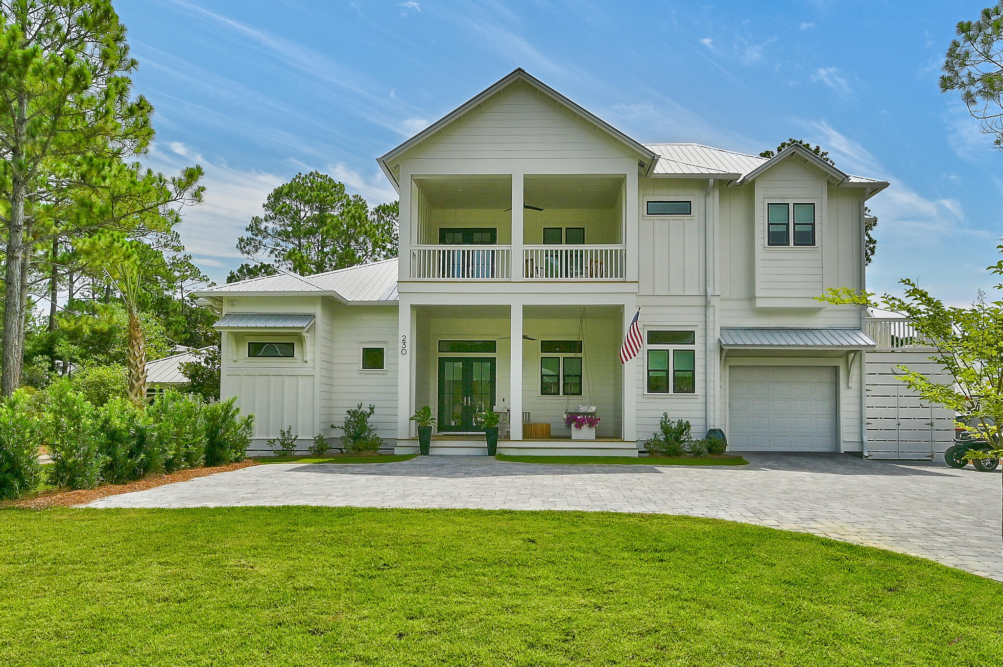 Expansive Beachside Home with Versatile Living SpacesWelcome to 230 Wood Beach Drive, nestled in the serene neighborhood of Seagrove Beach. This spacious house boasts 3,664 square feet of thoughtfully designed living space, offering a perfect balance of privacy and connectivity to the beach. With 11 rooms in total, this residence is ideal for both primary living and as an investment property with its versatile rental options.The moment you step into the open and inviting entry foyer, you're welcomed into a home that prioritizes both comfort and style. The gourmet kitchen stands out as a central hub, seamlessly connecting to the living and dining areas, and featuring high-quality appliances suitable for all culinary endeavors. The living room exudes a cool coastal vibe, providing a picturesque view of the large private pool.

The Master bedroom is are airy and comfortable, offering a private escape with direct access to the screened in porch and the expansive yard. The master bathroom provides ample space with thoughtfully separated grooming areas for convenience.

Adding to the property's flexible living arrangements is the carriage house, designed as spacious guest quarters. It includes a cozy living room, kitchenette, and a separate large King bedroom or access to the bunk room. The carriage house offers multiple configurations as a lockout unit, making it ideal for accommodating children, grandchildren, or a second family without sacrificing privacy.

Outside, the home doesn't disappoint. The large yard, enclosed by a tall privacy fence, ensures solitude and security, while the huge pool and sunbathing area offer the perfect spot for relaxation. The screened-in outdoor living and dining area with a summer kitchen makes entertaining effortless, no matter the weather.

The property's location on a very private dead-end cup-de-sac adds to the peace and tranquility, while still providing easy access to multiple beach entry points just a short stroll away. Seagrove Beach is known for its laid-back atmosphere and close-knit community, offering local dining, shopping, and recreational activities. With several transportation options nearby, including main roads for easy commuting, this location is as convenient as it is peaceful.

In summary, 230 Wood Beach Drive presents an extraordinary opportunity to own a versatile home in a sought-after beachside community, accommodating various living needs without compromising on comfort or potential rental income.