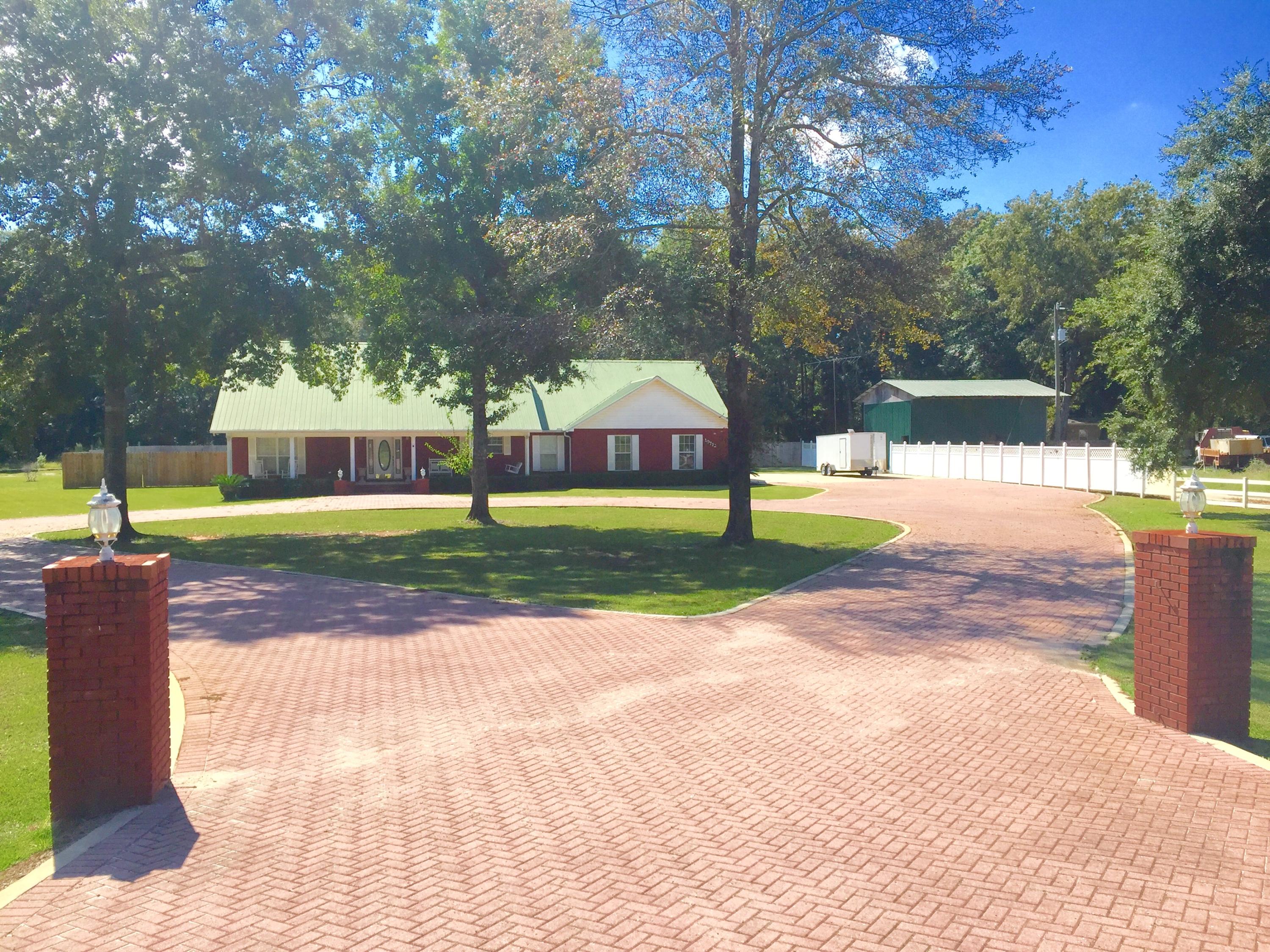 This charming country side red brick home is waiting for you. It sits back on 1.5 acres with a large circular brick paver driveway. The home features 3 bedrooms 2.5 baths, gourmet kitchen with stainless steel appliances, and large open floor plan. You will fall in love with this little charmer. The home is only minutes away from the beach, bay, Hwy 79 and the Panama City Beach Airport. Property being sold partially furnished. This property is located in Bruce Fl. just east of Freeport and not in Ponce De Leon Fl. The tax records are incorrect.