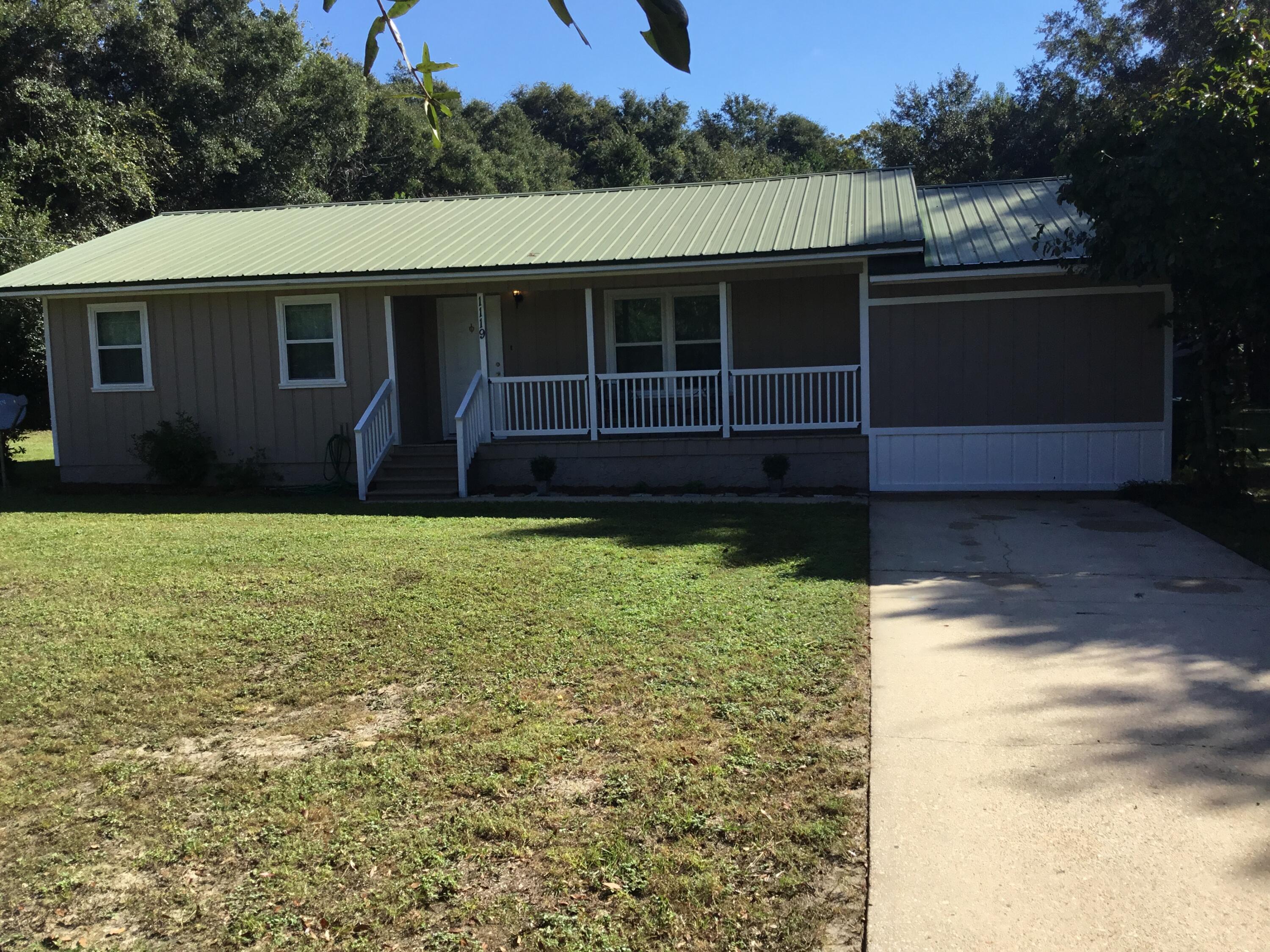 Welcome to your new home! Close to shopping, schools and restaurants. This 2 bedroom 1 bath home sits on 1 acre and has a chain link fence. Large utility/storage area that could be converted to a 3rd bedroom, den or office. This one won't last long! **All Information deemed important to be verified by the buyer.