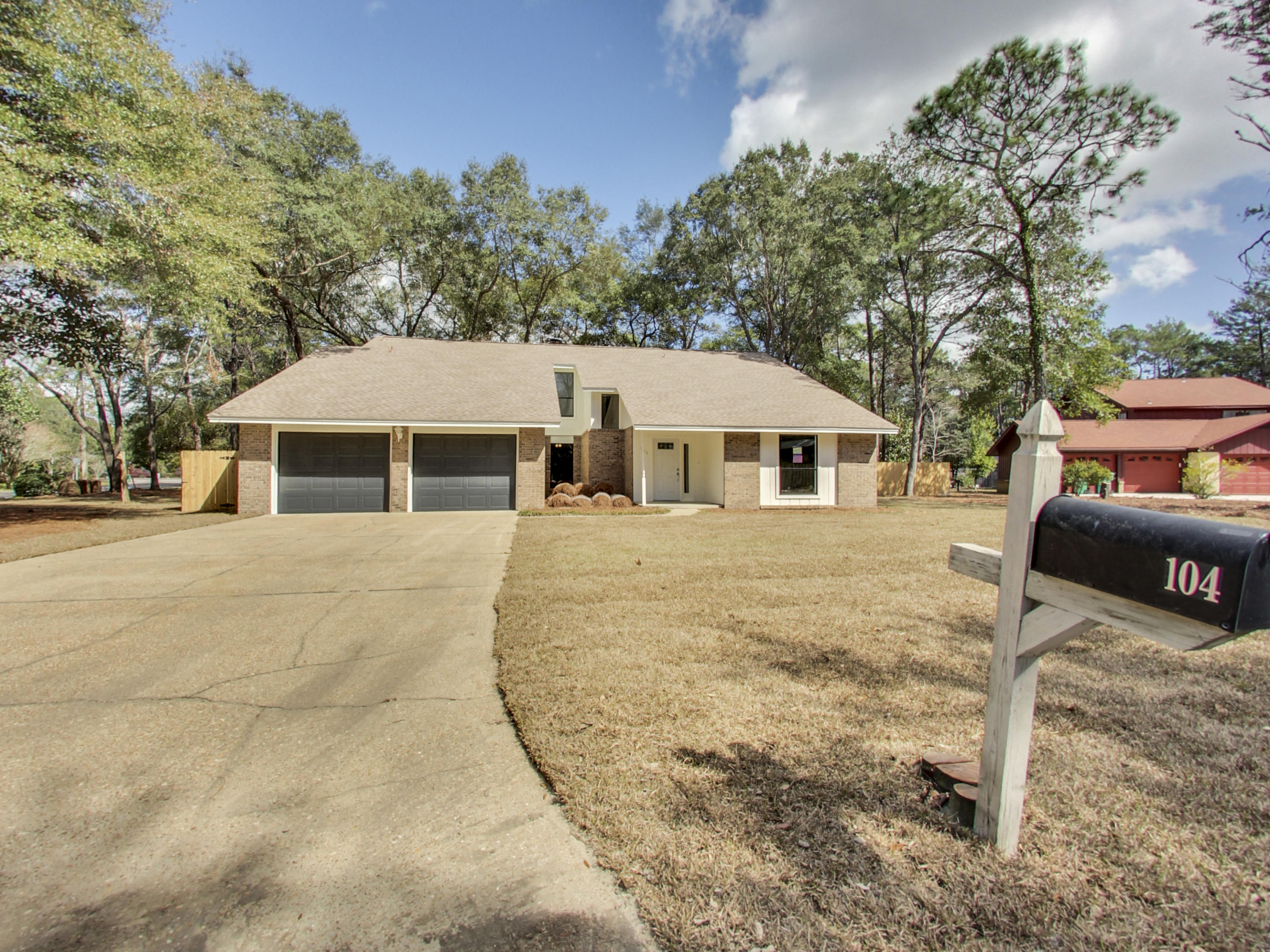 Beautifully remodeled 2,808 sq. feet, 4 bedroom 2.5 bath home in Niceville in Rocky Bayou. This home has a new contemporary finishes with sleek grey tones. Electric is copper wiring. The new kitchen has been updated with white shaker cabinets with soft close features, fantasy brown granite tops, stainless appliances, recessed lighting, center island. The whole house has been updated with ceilings scraped and textured, new vinyl laminate flooring, carpet in the bedrooms, new lighting, new paint, baseboards, doors, wood stairs, handrails, new A/C and heat (upstairs and downstairs), new master bathroom, new shelving, new guest bath cabinets, granite, lighting, and mirrors. New roof Dec 2017, new fence, and new garage doors. This house has had a total makeover and is ready for your family.