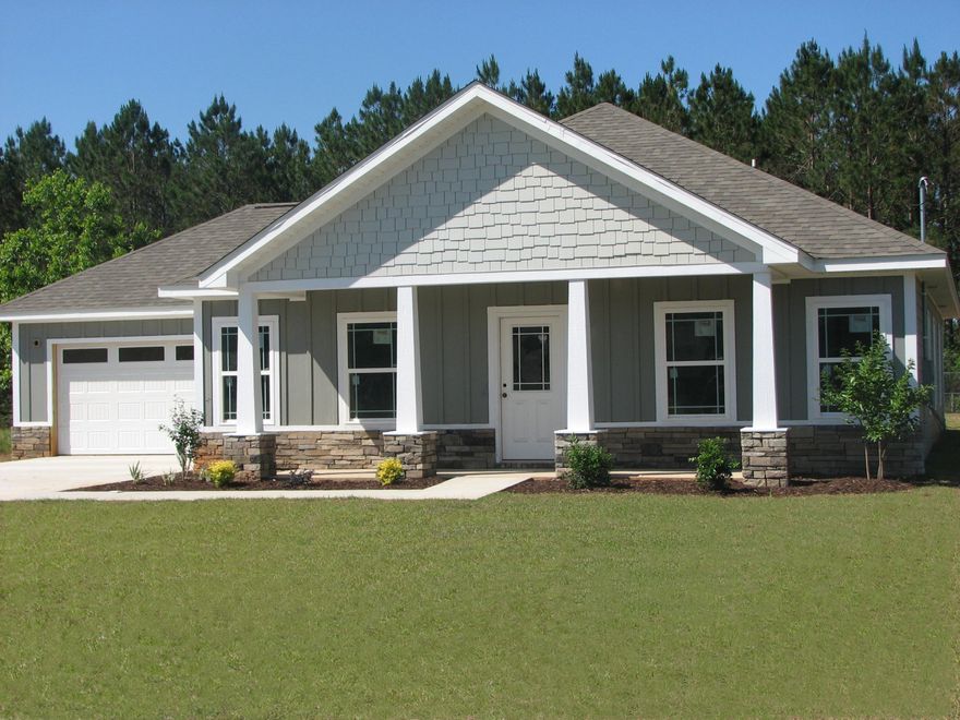 5 BEDROOM F-L-E-X plan! PARADE OF HOMES WINNER! Have your office/study, media/game/fitness rm, nursery/homework/play rm, sewing/crafts or sleepover/guest rm -OR- 5 real BR's if needed! Old fashioned HEART OF THE HOME ''gathering table'' makes family meals more common & projects often shared. Smooth granite breakfast bar & island kitchen = 2 more dining options + double door formal dining rm (flex). Craftsman column welcome porch, Batten board style Hardi Plank, stack stone accents, big covered back porch. FLEXIBLY fresh in lifestyle adaptations ...yet charming in quaint southern Craftsman touches & central gathering table spot layout. Commute is 10 min country drive & just 3 lights to SOUTH 85 bridge... Baker School (K-12) only a block away. MOST CLOSING COST PAID