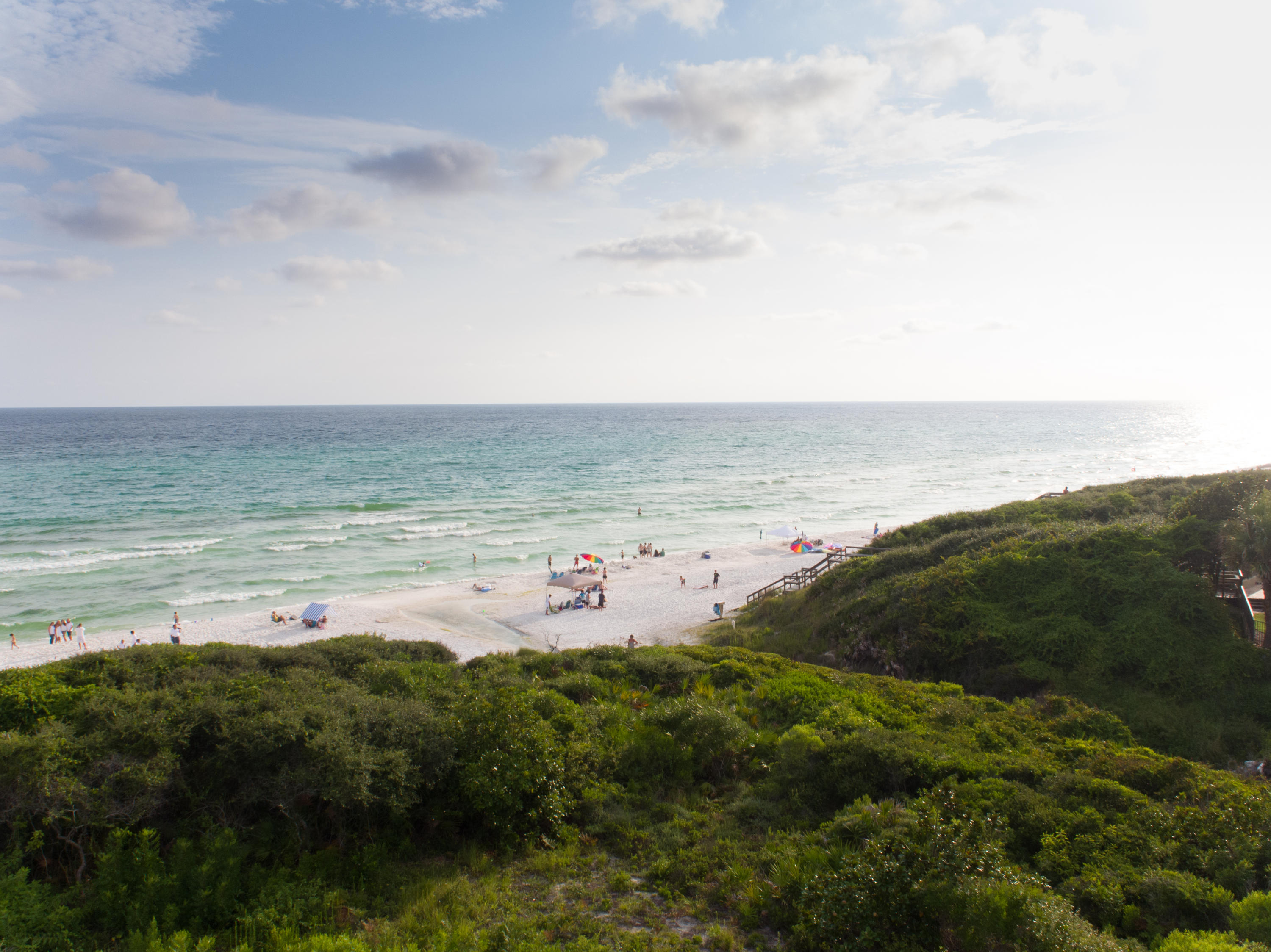 107 feet overlooking the beach and Gulf of Mexico. This lot offers privacy but is in Seagrove close to restaurants and shopping. Beach Walkover is already constructed. Design your home to take advantage of one of the best views along Hwy 30a. Each room could have views of the Gulf. Lot is .52 acres and contains a large footprint. . No homeowners association or architectural review board , so you can design your home with only your criteria and needs in mind. This is a must see if looking for a building site overlooking Gulf of Mexico.