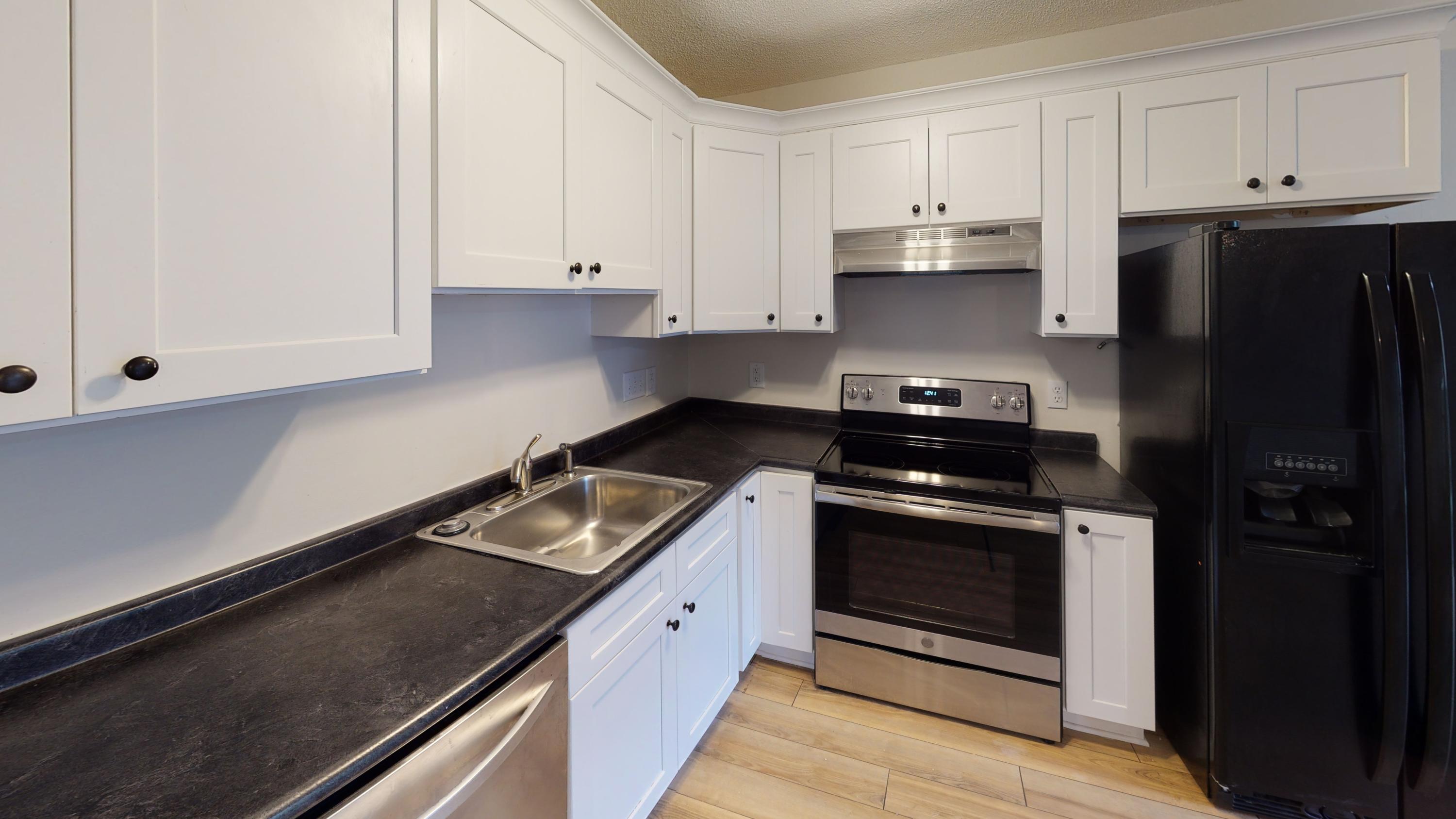 Now on the market! Renovated two bedroom townhome with two full bathrooms and an enclosed garage! This home is centrally located near bases, shopping, restaurants, and more. Brand new roof just installed this month. This home features new flooring and recently renovated kitchen. The home also has updated bathroom vanities. And if you like technology, it also has a Ring video doorbell and a programmable Nest thermostat! Relax on the back patio complete with a privacy fence. Make your appointment today