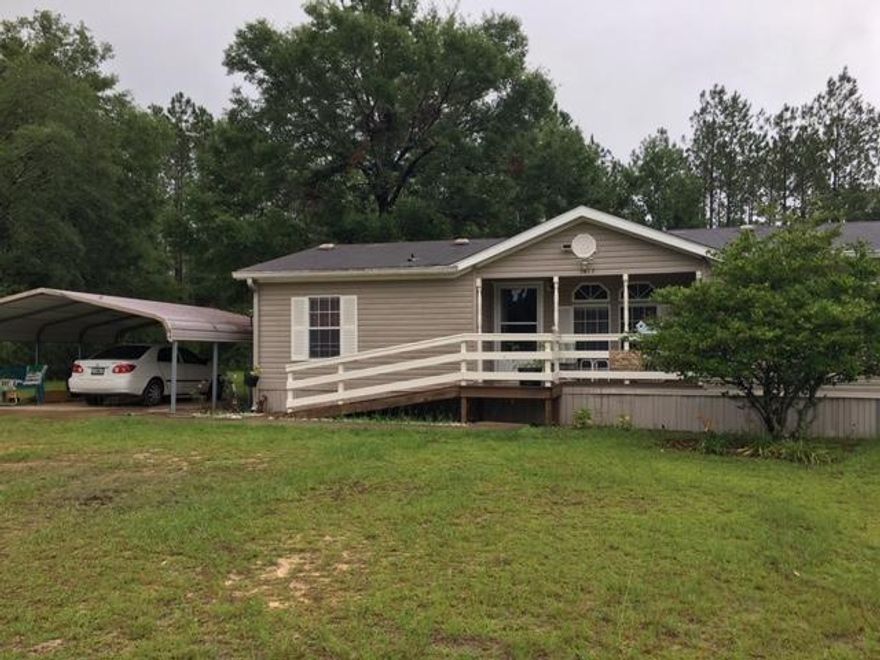 This home is located at the corner of Black Creek Blvd and Hwy 3280. Just minutes to Freeport and Beaches of South Walton. Also sits on lot just over 1 acre. Come See!!