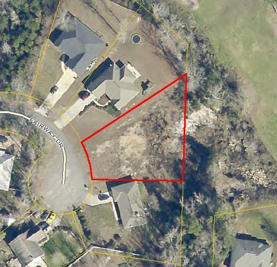 Golf Course building lot in Crestview, located on the 17th Fairway. It's close in to town yest located outside the city limits which means lower property taxes! Cleared and ready for you to build your home! Water and electric are available.