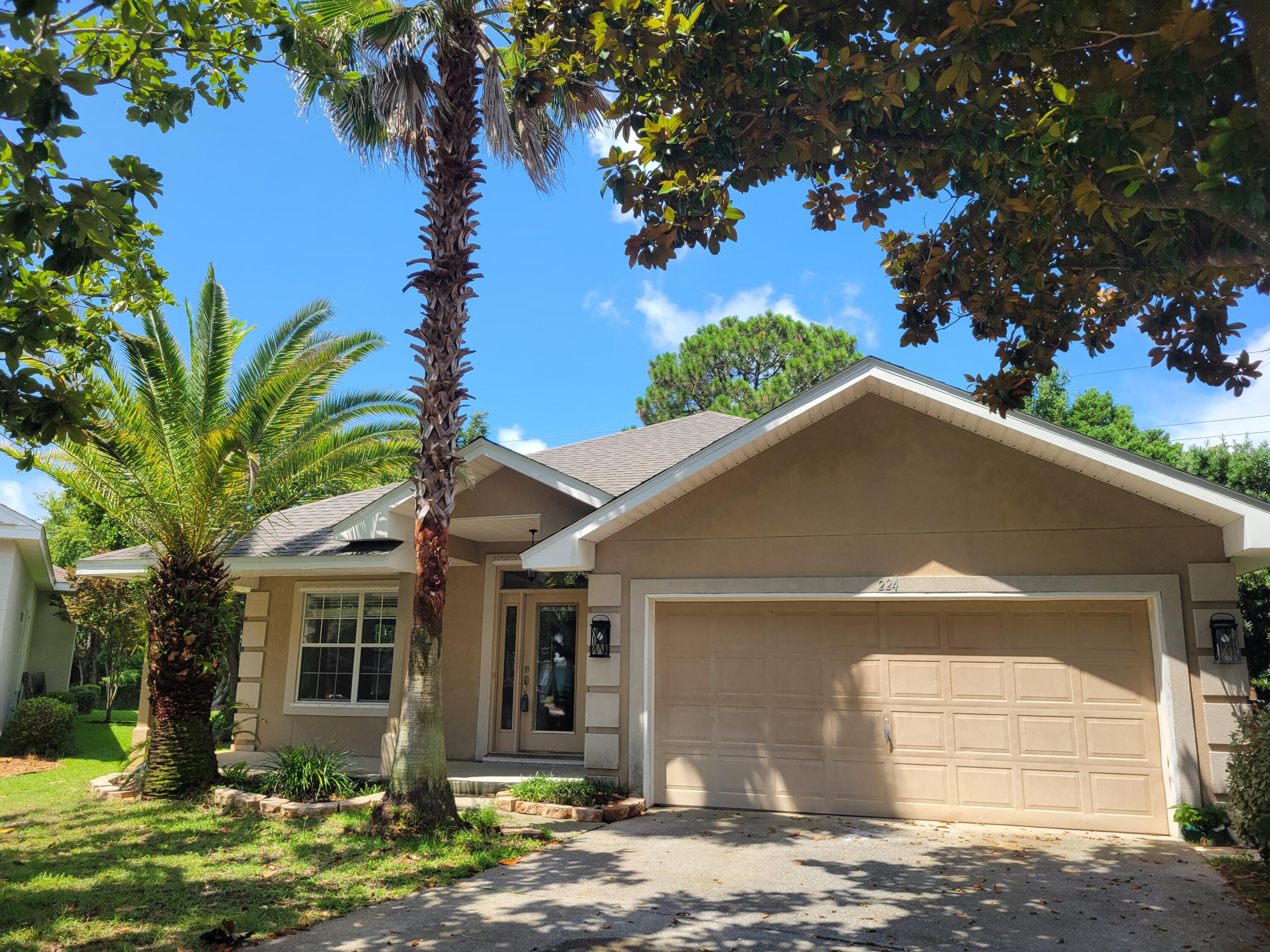 This lovely three bedroom house is situated on a cul-de-sac in the gated community of Emerald Lakes at the front on Talquin Cove. Offering privacy and serenity on the lake, with a new roof and flooring in 2025, new light fixtures, sprinkler system, master bath shower and landscaping. Emerald Lakes is conveniently located to Destin Commons and public beach access near Pompano Joe's and the Crab Trap.