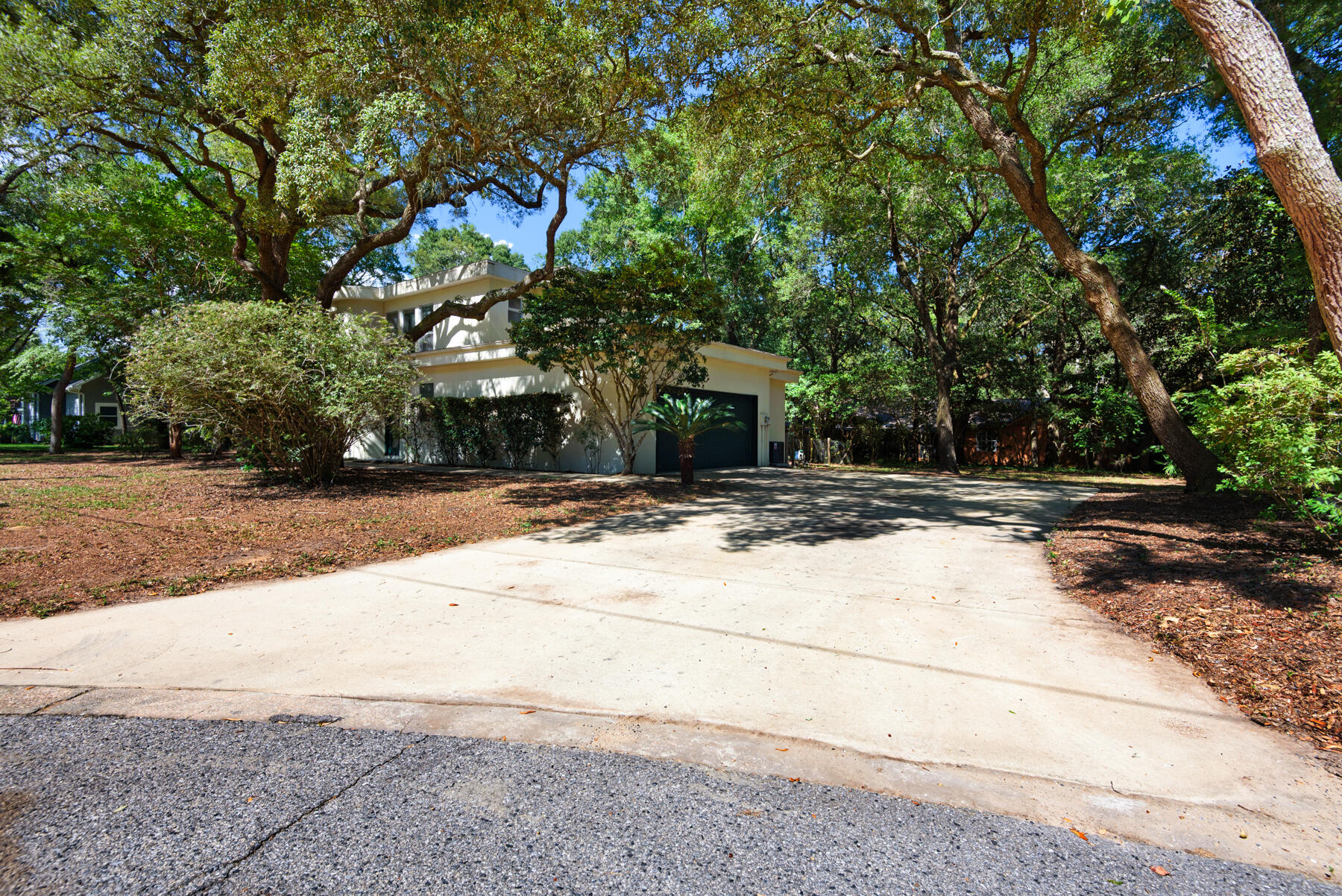 Welcome to this custom-built, open-concept home on beautiful Woodbriar Court! Located in the highly desirable Kenwood area and nestled on a .34-acre lot with mature oak trees, this home offers the perfect mix of comfort, style, and space. Inside, you'll find three large bedrooms, each with its own private bath, including a main-level master suite. The spacious kitchen connects to a formal dining room and a heated and cooled Florida room, creating extra living space that's perfect for entertaining or relaxing. Enjoy soaring ceilings, plenty of natural light, and an open, airy feel throughout the home. Important updates include two high-efficiency HVAC systems (2020) and a gas water heater (2022). Property is just a short golf cart drive away from nearby Eldredge park on Chula Vista bayou. Whether you're looking for a forever home or a great investment this property has tons of potential and is priced to move. Schedule to come see it today!