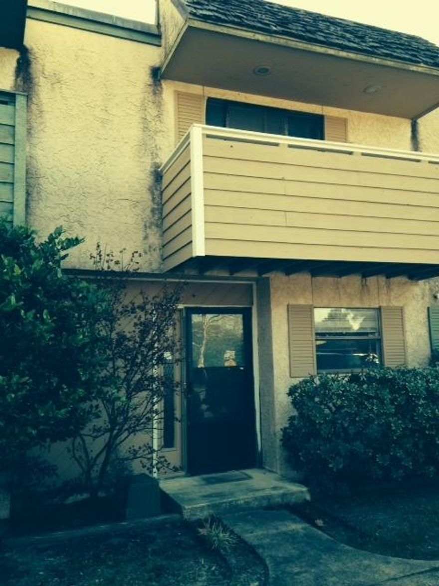 Two story townhome in Destin. Small complex with no association fees. Large living/dining area. Washer and Dryer hookups on the first floor along with a half bath. Second floor has two bedrooms and a full bath. Adjoining is a powder room adding a second sink and toilet. Balcony with sliding glass doors off the front bedroom. Privacy fenced backyard with concrete patio and a storage closet.