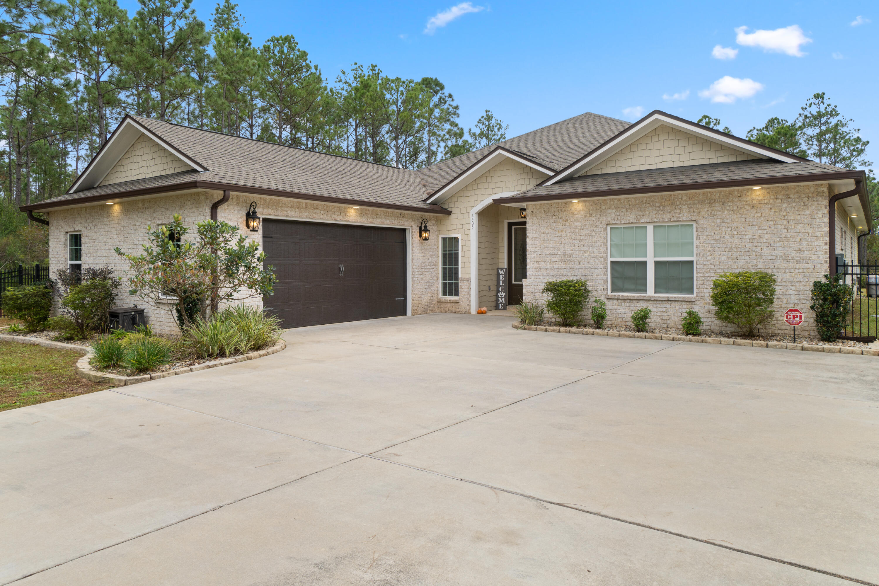 Rare 2.03 acre home with Beautiful POOL in Whispering Pines subdivision; Pavers are an upgrade to enhance beauty of the entry; Contemporary style all brick and shiplap home with 4 bedrooms, 3 full baths, high ceilings, formal dining room, and covered rear porch. Gorgeous porcelain tile floors throughout the home! Large entry with Double french doors invites gatherings to this beautiful 3144 sq ft home; Kitchen is open to the large Living area that also has a breakfast area and a Formal Dining Room! Kitchen has Granite, Wine refrigerator, Farm Style Stainless sink, Whirlpool Gold stainless steel appliances, also includes Custom Antique White cabinets, Beautiful Gold and brown backsplash, stainless hooded vent above stove; All baths have granite, 2 baths have double vanities, Showers are