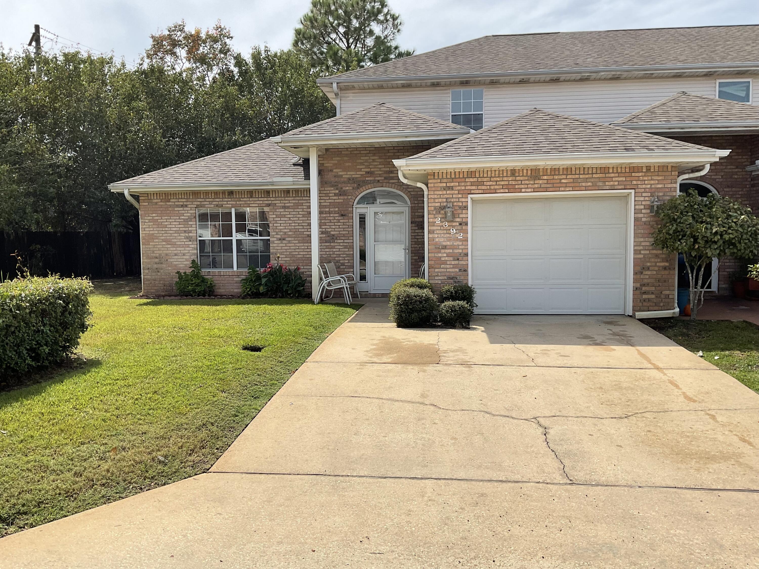Less then 10 minutes to Eglin AFB. This  3 Bedroom 2 1/2 Bath townhome with deeded access to the water sits on a quiet cul de sac. The master suite is downstairs and 2 bedrooms and a bath upstairs. Off the foyer is a 1/2 bath with a pedestal sink and the linside laundry. The downstairs floors are all tile except for the master bedroom which is carpeted.  Open living/dining/kitchen area features a breakfast bar, built-in book shelves, crown molding and glass doors leading to a patio. There is an electric roll down patio canape ( which also has a remote), that covers the patio. Upstairs there are 2 good sized bedrooms with a jack and jill full bath. The front bedroom has a large closet plus a walk-in closet. Walk across the quiet street down to the water where there is a......