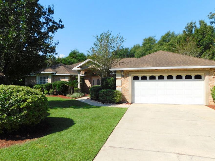 Check out this beautiful, custom built home in the sought after Shoal River area in South Crestview. There is an 18,000 gallon in-ground, salt water swimming pool, covered patio/pool area, natural gas piped in for BBQ, all brick exterior and wonderfully landscaped grounds. There is also an in-ground sprinkler system, over sized garage and excellent street appeal. Inside you will find an open flowing floor plan with 3 bedrooms in a split bedroom floor plan and a kitchen open to the great room and over looking the swimming pool and covered patio area. There are vaulted and trayed ceilings, tiled floors and berber carpets, large interior laundry room, nice etched glass front door and covered porch. This home is turn key ready and clean. Check out the lower county property taxes as a bonus!