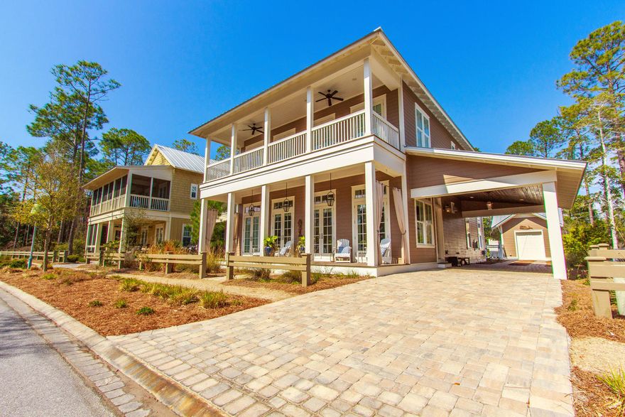 Magnificent Watercolor home with a rare private pool with spill-over hot spa.
Enjoy the privacy of this beautiful home that sits on one of Watercolors larger lots that backs up to the state forest and boasts both car port and small storage garage.
Gas lanterns lining the front porch welcome you in to an open-floor concept living area, full of natural light with 12 Ft ceilings and wire brushed walnut floors throughout. A large gourmet kitchen, that would make the best chef proud, features a huge island with light-granite countertops, Wolf gas stove/oven Sub-Zero appliances, ice-maker and wine cooler non-slam drawers.
The open family room has a beautiful floor to ceiling shell tabby fireplace that opens up to a large screened lanai that includes a summer kitchen, fireplace, outdoor TV and walks out to the full sized salt pool and spa in a private setting that backs up to the preserve.  
The downstairs master is incredibly spacious and defines elegance with coffered ceilings and flows into the master bath which offers extensive tile work and a huge marble walk-in shower. 
The second floor includes another living room/den and an additional master bedroom with marble shower and over sized closet plus 2 more full bedrooms and a great bunk room for the kids. 
This home has NEVER been on the rental program and is immaculate!
An incredible home surely to not to be missed...
Being sold unfurnished, but furnishings are negotiable.