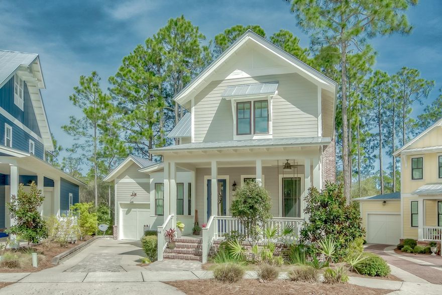 The view is spectacular from this beautiful Blue Mountain home set on a serene, water-front property along a semi-private cul-de-sac. The gated Forest Lakes neighborhood is picturesque full of long-leaf pines, pavered streets, nature trails, a fish-stocked lake, large community pool, two-tiered entertaining pavilion, green space and an imaginative park.This immaculate open-plan home is move-in ready. The upstairs master has a large balcony overlooking the lake for your morning coffee, while the smaller downstairs master is ideal for guests! Upgrades include a built-in desk in the loft area, wifi-based security system, hurricane window fabric, porch swing, and a lofted storage area in the one-car garage.This residence would make the perfect primary residence or second home. There