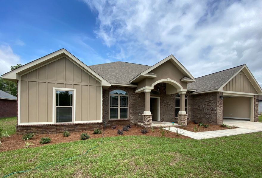 This popular floor plan sits on .31 acres and features a spacious 20'x20' Florida Room overlooking the back patio and yard. Quality handmade maple cabinets adorn an open-island kitchen, complimented with flush-mount LED lighting overhead and under-mount lighting above the granite countertops. The Master Suite has an extra-large walk-in closet and a ceiling hop-up with crown molding. Our custom Master Bath has a tiled shower and separate tiled-tub, with a half-glass wall in between for a beautiful setup. A double-vanity with granite countertop is also included in the Master Bath. One additional bedroom and bathroom are located on their own hallway for a more private area, and two additional bedrooms and a full bath are located on a separate hallway for a true split-layout.