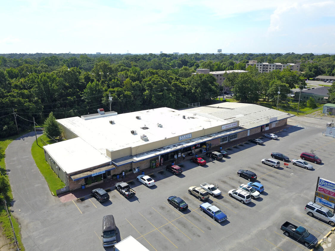 32,253 SF Retail Center located on Pace Blvd. Current tenants include Barnes Supermarket, a Beauty Supply Store and a Laundry Mat. Currently have 12,000 sf available for lease.